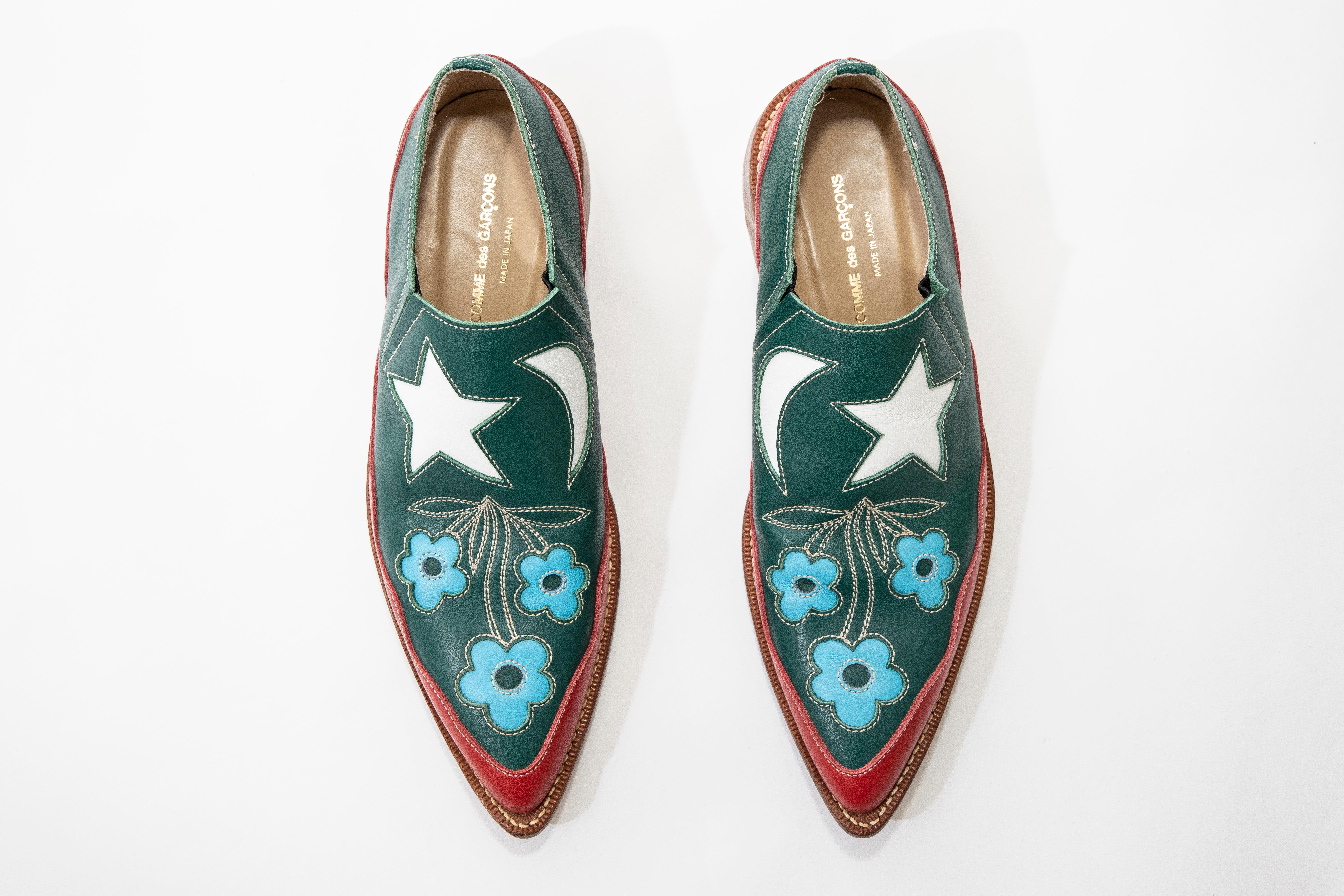 Comme des Garçons Runway Fall 1998, leather loafers with abstract pattern throughout, contrast stitching and stacked heels.

US. 7.5  JP. 24.5

Heels: 1