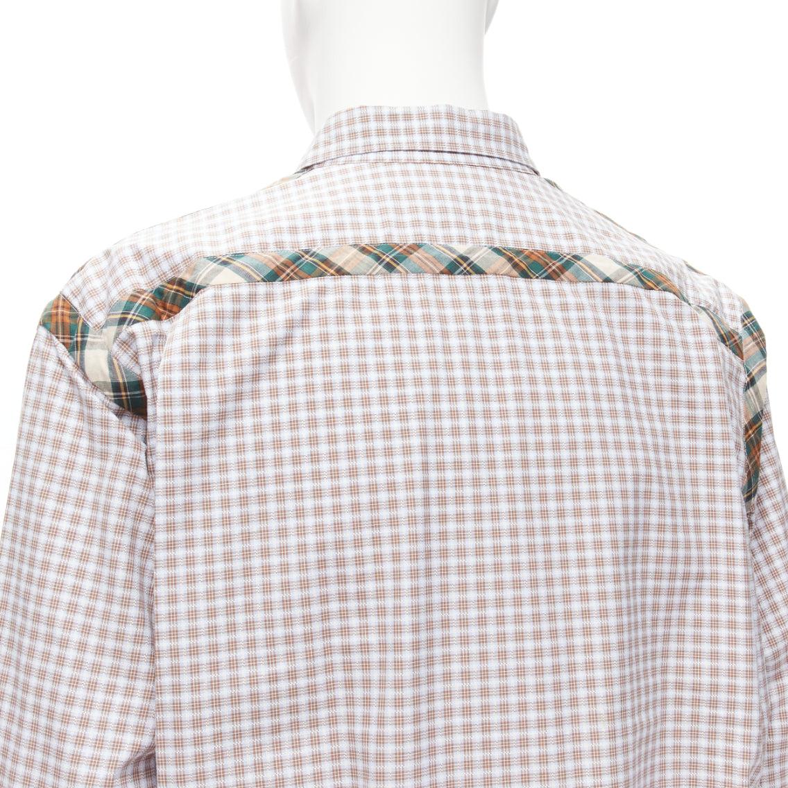 COMME DES GARCONS SHIRT brown blue white mixed plaid cotton shirt L
Reference: CAWG/A00265
Brand: Comme Des Garcons
Collection: SHIRTS
Material: Cotton
Color: Brown, Multicolour
Pattern: Plaid
Closure: Button
Extra Details: Shell button closure.