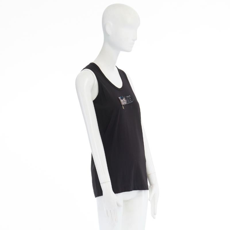 COMME DES GARCONS SS1992 black cotton ethnic raw patch vest tank top S
Reference: CRTI/A00147
Brand: Comme Des Garcons
Designer: Rei Kawakubo
Collection: Spring Summer 1992
Material: Cotton
Color: Black
Pattern: Solid
Extra Details: FROM THE SPRING