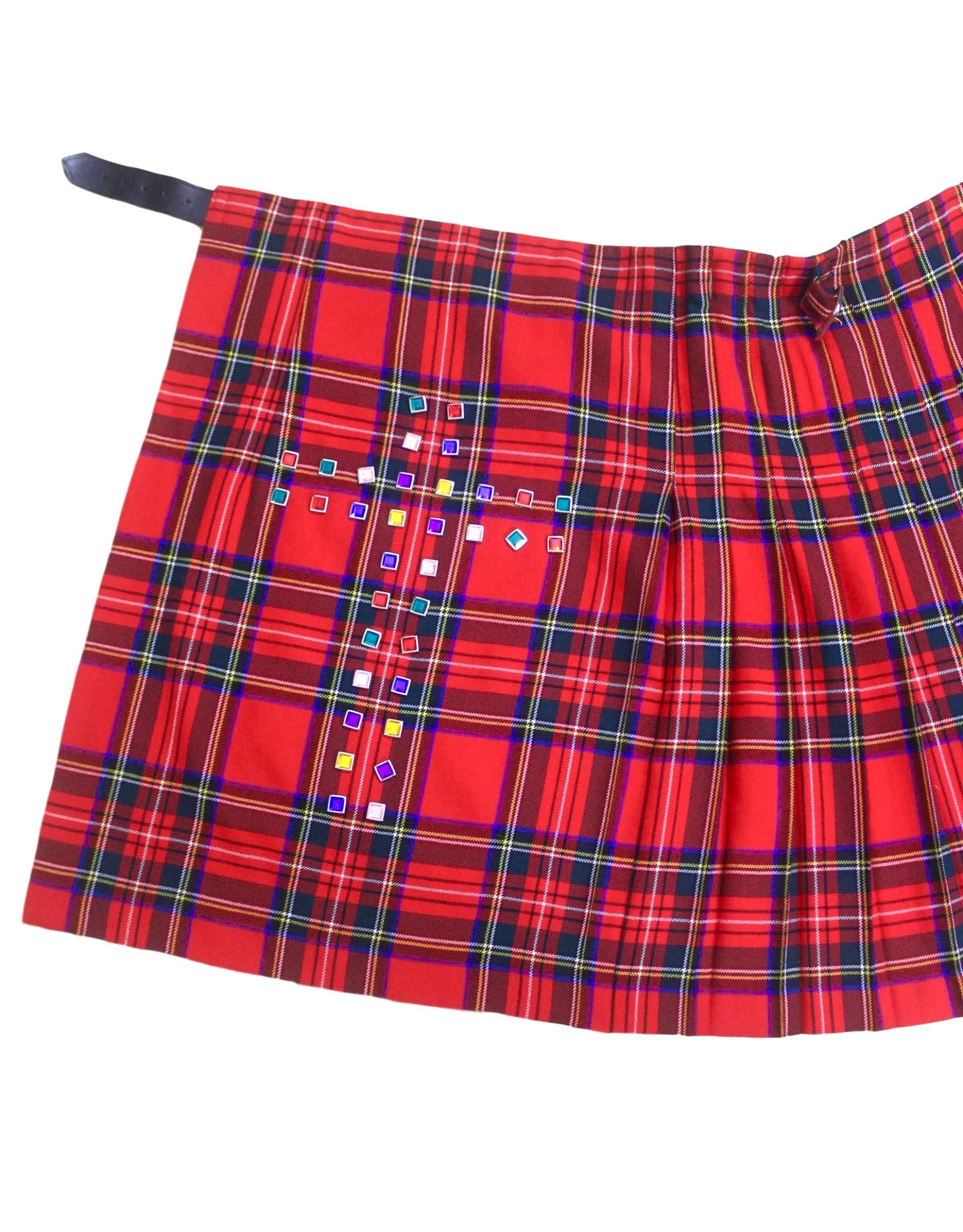 Comme des Garcons
AD 2000
Tartan Kilt with Jewelled Cross
Pleated Back
Wrap Around with Leather Strap and Buckles
No size
