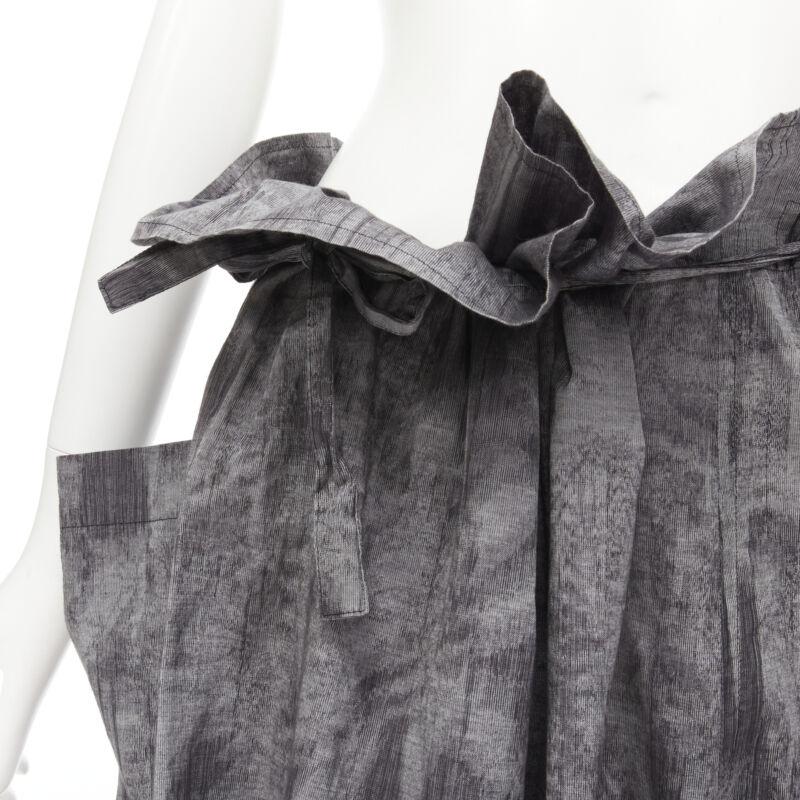COMME DES GARCONS Tricot 1980s Vintage grey oversized tie waist asymmetric pants
Reference: CRTI/A00633
Brand: Comme Des Garcons
Designer: Rei Kawakubo
Material: Cotton
Color: Grey
Pattern: Solid
Closure: Drawstring
Extra Details: Drawstring to