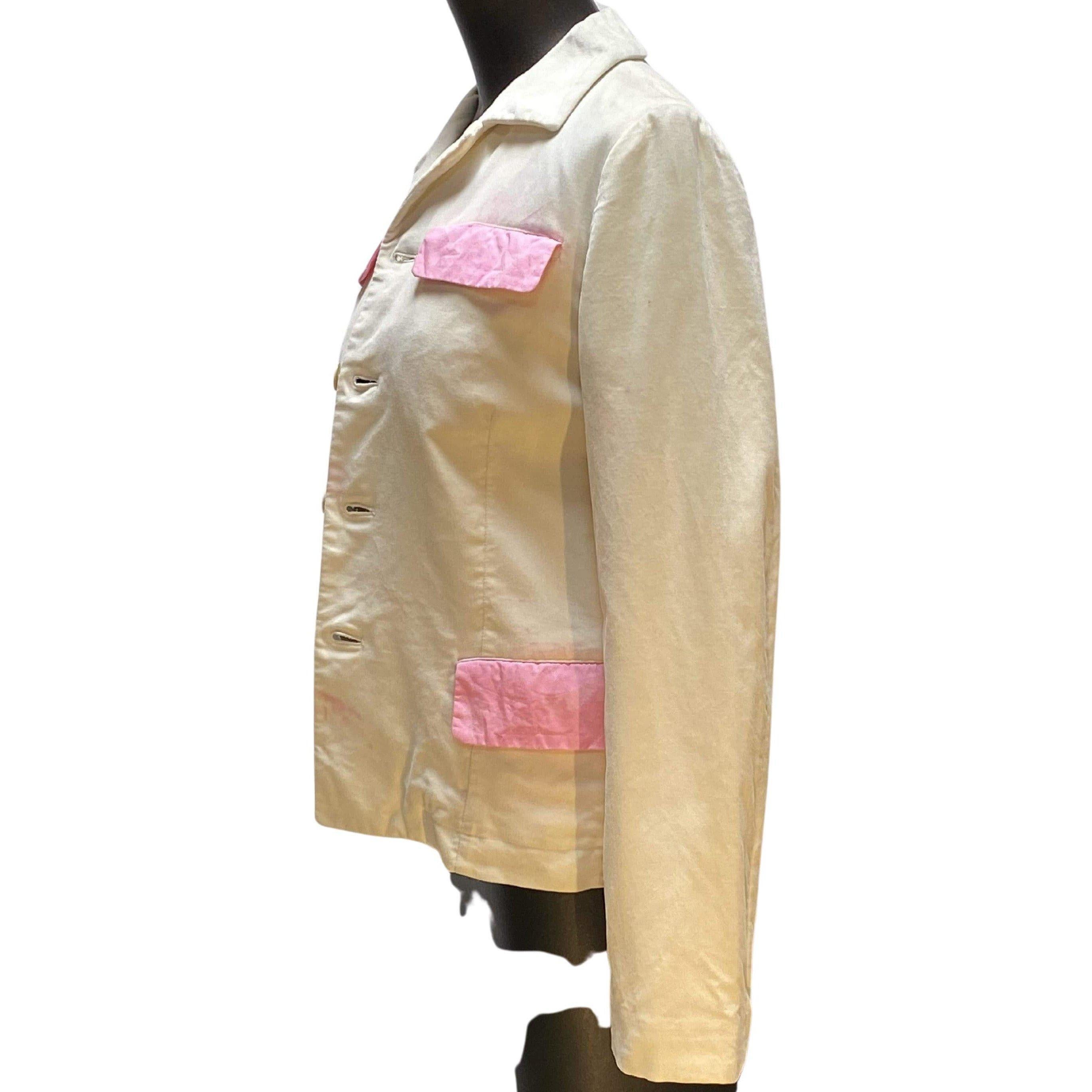This vintage cream-colored velvet button-down Comme des Garçons jacket is made unique with its 