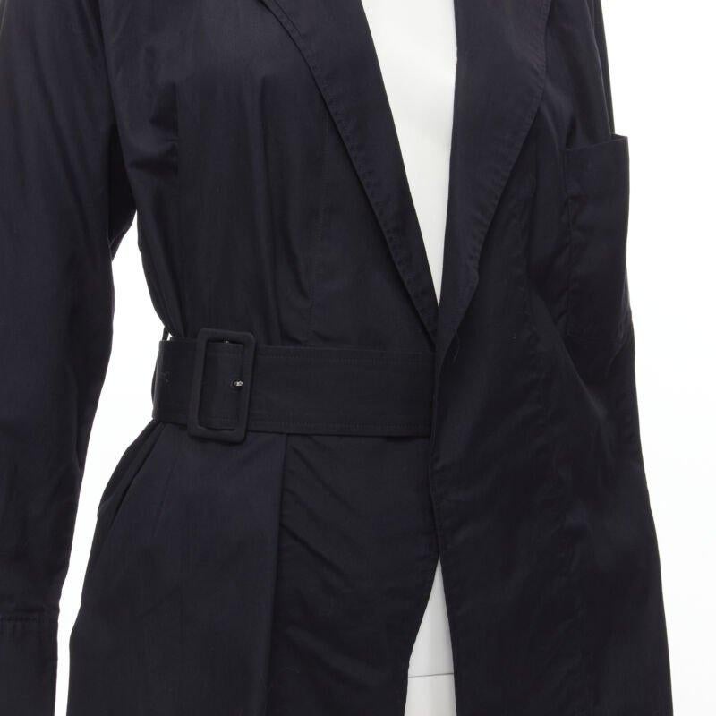COMME DES GARCONS Vintage 1980s black asymmetric belted deconstructed blazer  M
Reference: CRTI/A00608
Brand: Comme Des Garcons
Designer: Rei Kawakubo
Collection: 1980s
Material: Cotton
Color: Black
Pattern: Solid
Closure: Belt
Extra Details: