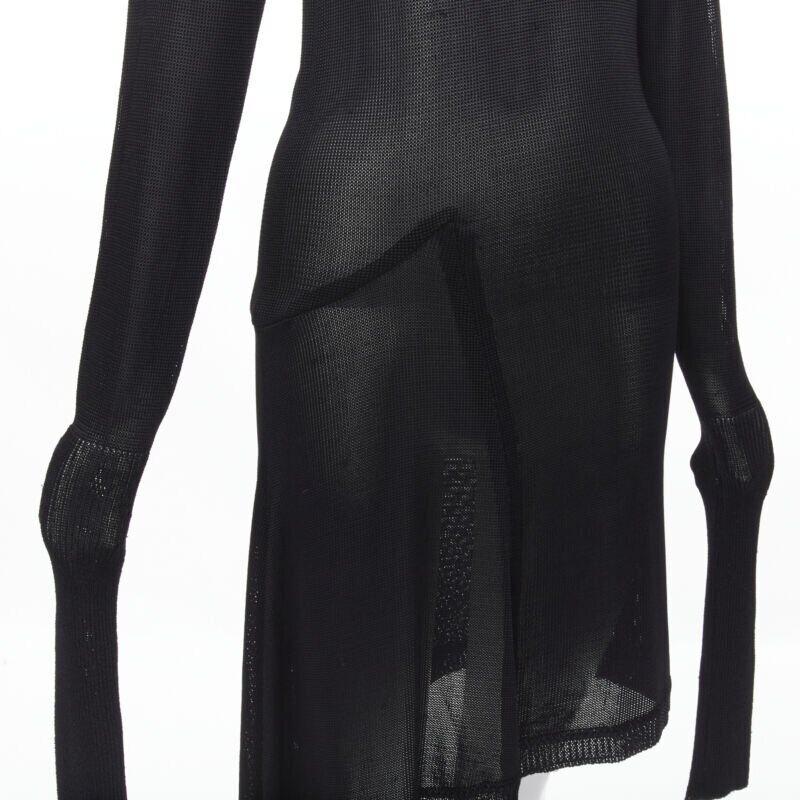 COMME DES GARCONS Vintage 1980s black extra long sleeves angular sweater dress
Reference: CRTI/A00554
Brand: Comme Des Garcons
Designer: Rei Kawakubo
Collection: 1980s
Color: Black
Pattern: Solid
Extra Details: Angular seam seam at lower hip.