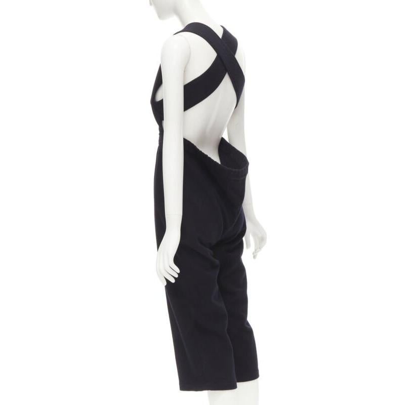 COMME DES GARCONS Vintage 1980's black wool cross back cropped jumpsuit S
Reference: CRTI/A00506
Brand: Comme Des Garcons
Designer: Rei Kawakubo
Collection: 1980s
Material: Wood, Blend
Color: Black
Pattern: Solid
Closure: