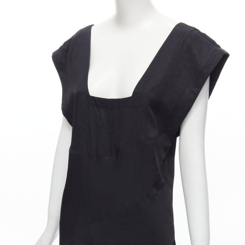 COMME DES GARCONS Vintage 1980s square neck oversized bias cut dress
Reference: CRTI/A00555
Brand: Comme Des Garcons
Designer: Rei Kawakubo
Collection: 1980s
Color: Black
Pattern: Solid
Extra Details: Square neckline. Oversized fit. Asymmetric