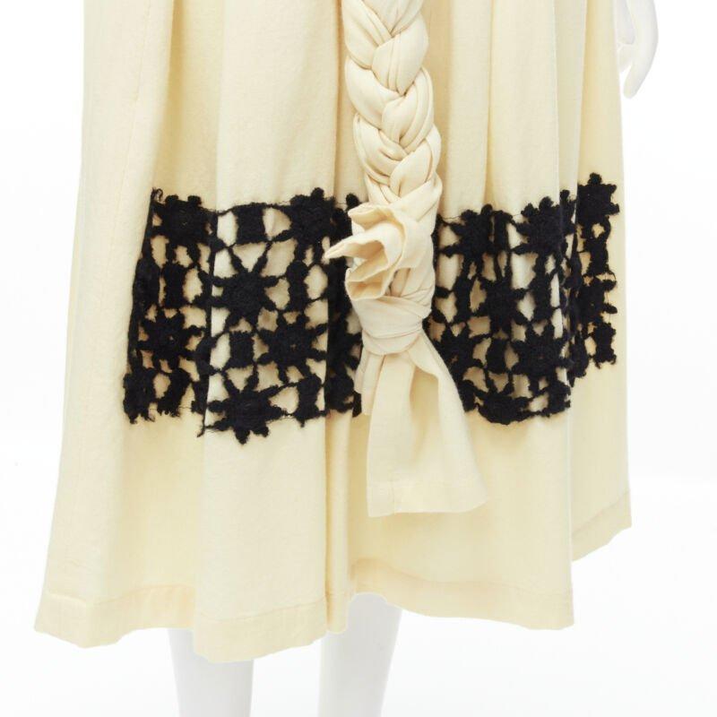 COMME DES GARCONS Vintage 1988 cream wool braid black lattice embroidery skirt M
Reference: CRTI/A00560
Brand: Comme Des Garcons
Designer: Rei Kawakubo
Collection: 1988
Material: Wool
Color: Cream, Black
Pattern: Solid
Extra Details: Pleated at