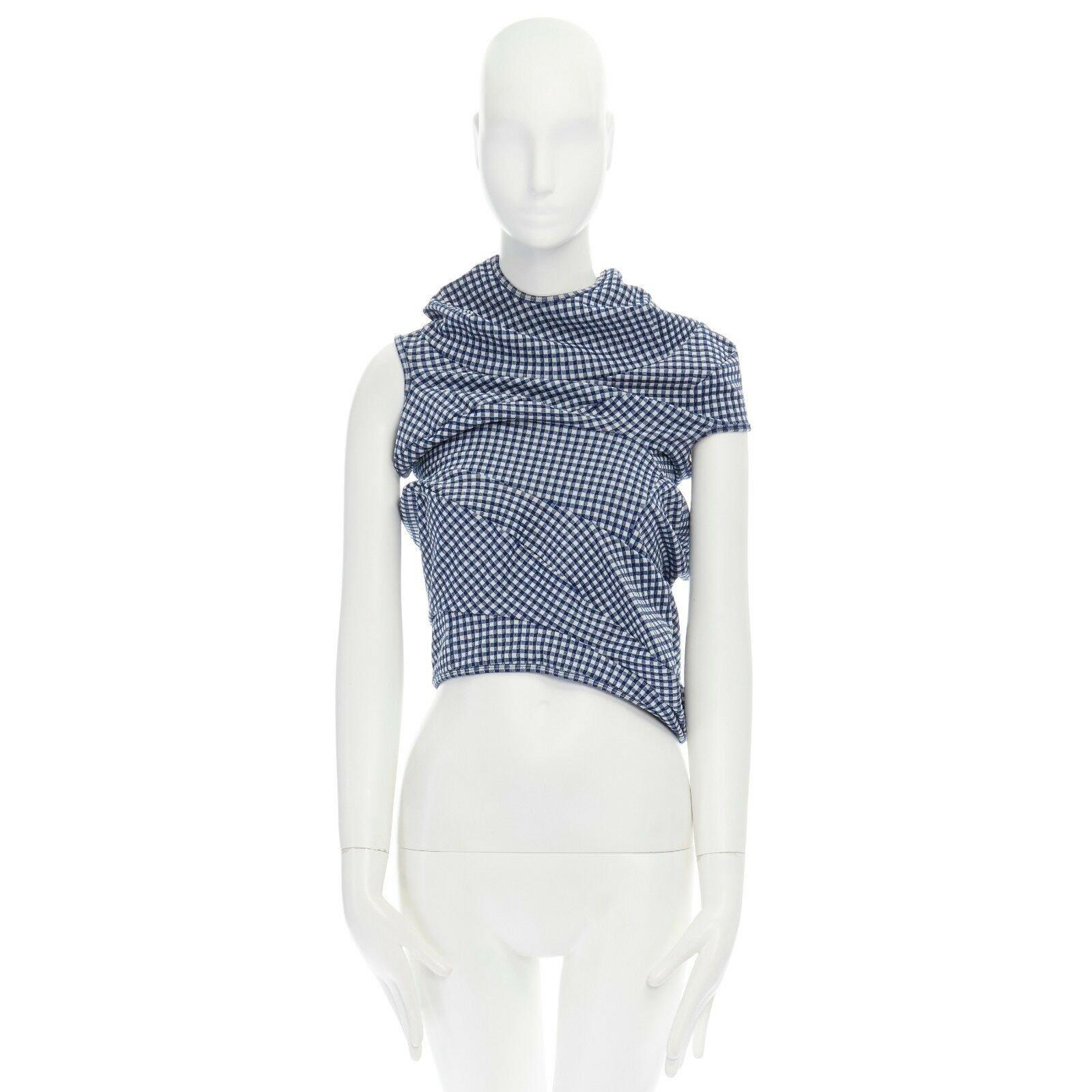 COMME DES GARCONS Vintage 1997 Lumps Bumps blue white gingham irregular cut top 
Reference: ANSN/A00052 
Brand: Comme Des Garcons 
Designer: Rei Kawakubo 
Material: Polyester 
Color: Blue 
Pattern: Check 
Extra Detail: Polyester, nylon,