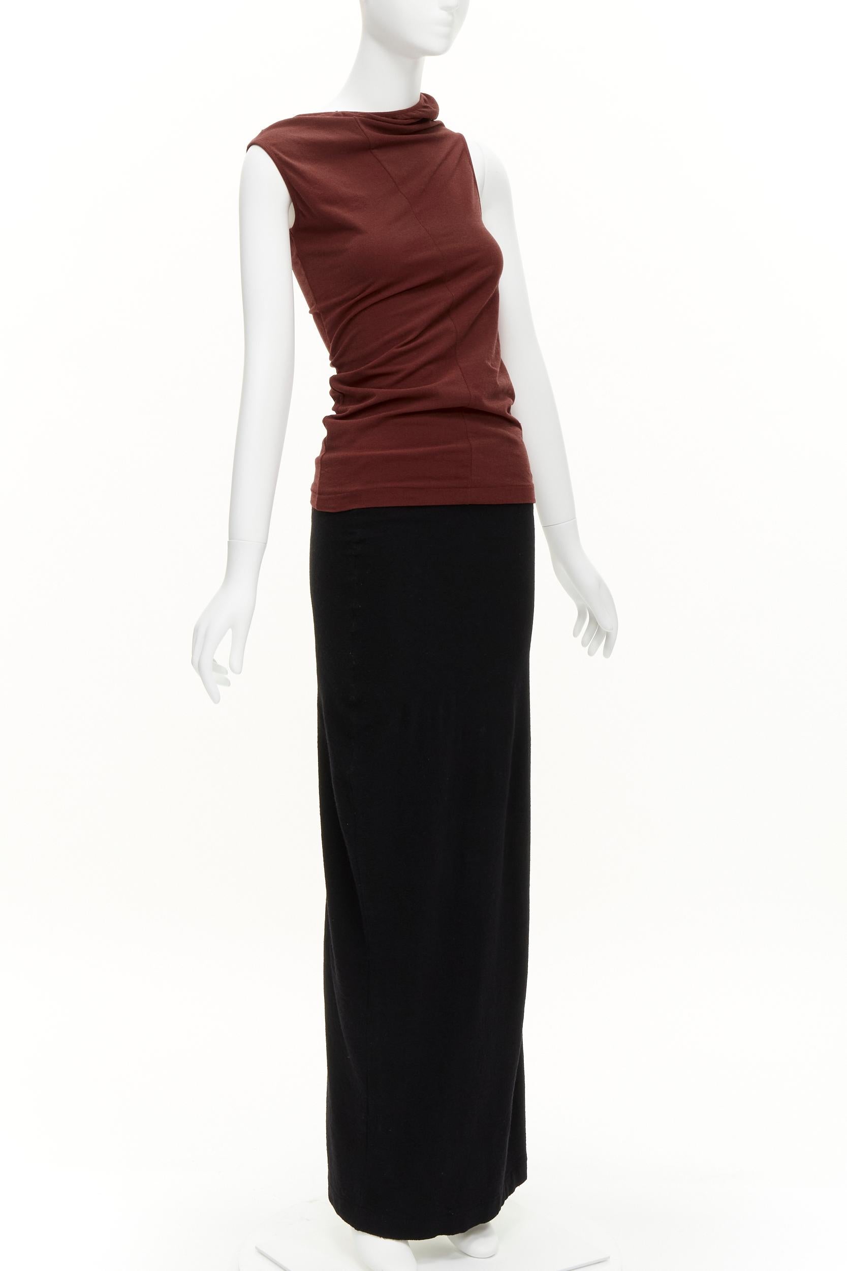 COMME DES GARCONS Vintage 1997 Lumps & Bumps red asymmetric top black skirt M
Reference: CRTI/A00043
Brand: Comme Des Garcons
Designer: Rei Kawakubo
Collection: AD1996
Material: Nylon
Color: Red, Black
Pattern: Solid
Extra Details: Asymmetric cut