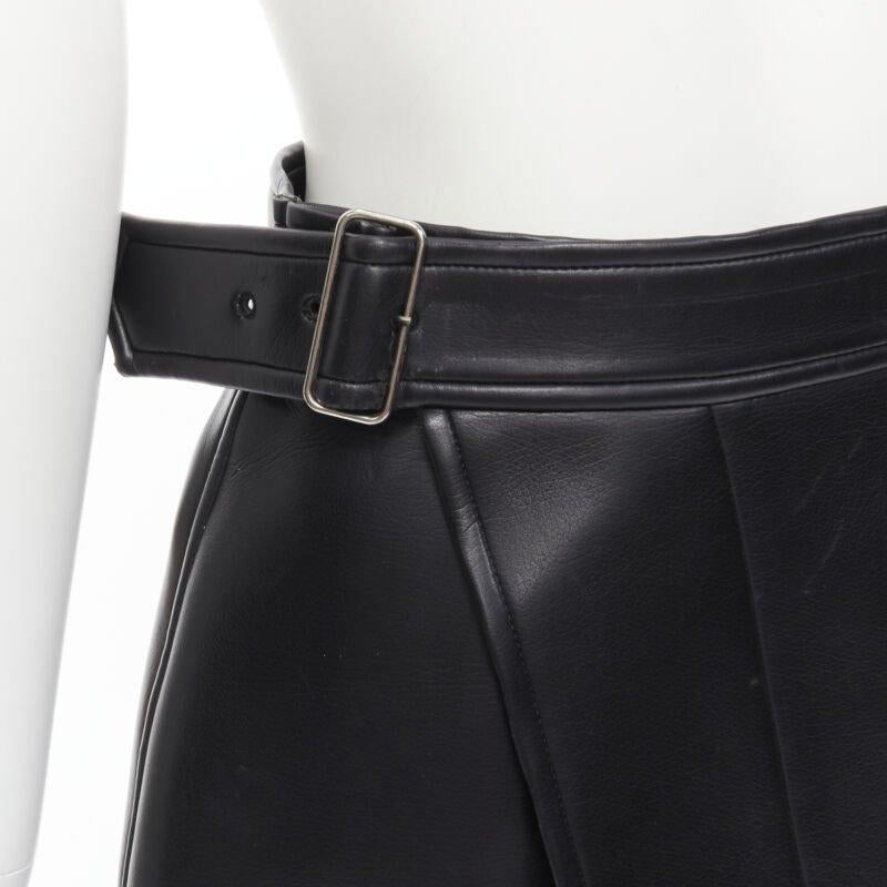 COMME DES GARCONS Vintage black faux leather silver buckle wrap skirt M
Reference: CRTI/A00512
Brand: Comme Des Garcons
Designer: Rei Kawakubo
Material: Faux Leather
Color: Black
Pattern: Solid
Closure: Buckle
Extra Details: Silver-tone buckle. Wrap