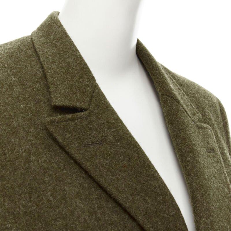 COMME DES GARCONS Vintage moss brown wool felt gold double breasted blazer M
Reference: CRTI/A00631
Brand: Comme Des Garcons
Designer: Rei Kawakubo
Material: Wool
Color: Green
Pattern: Solid
Closure: Button
Extra Details: Moss brown wool felt.
