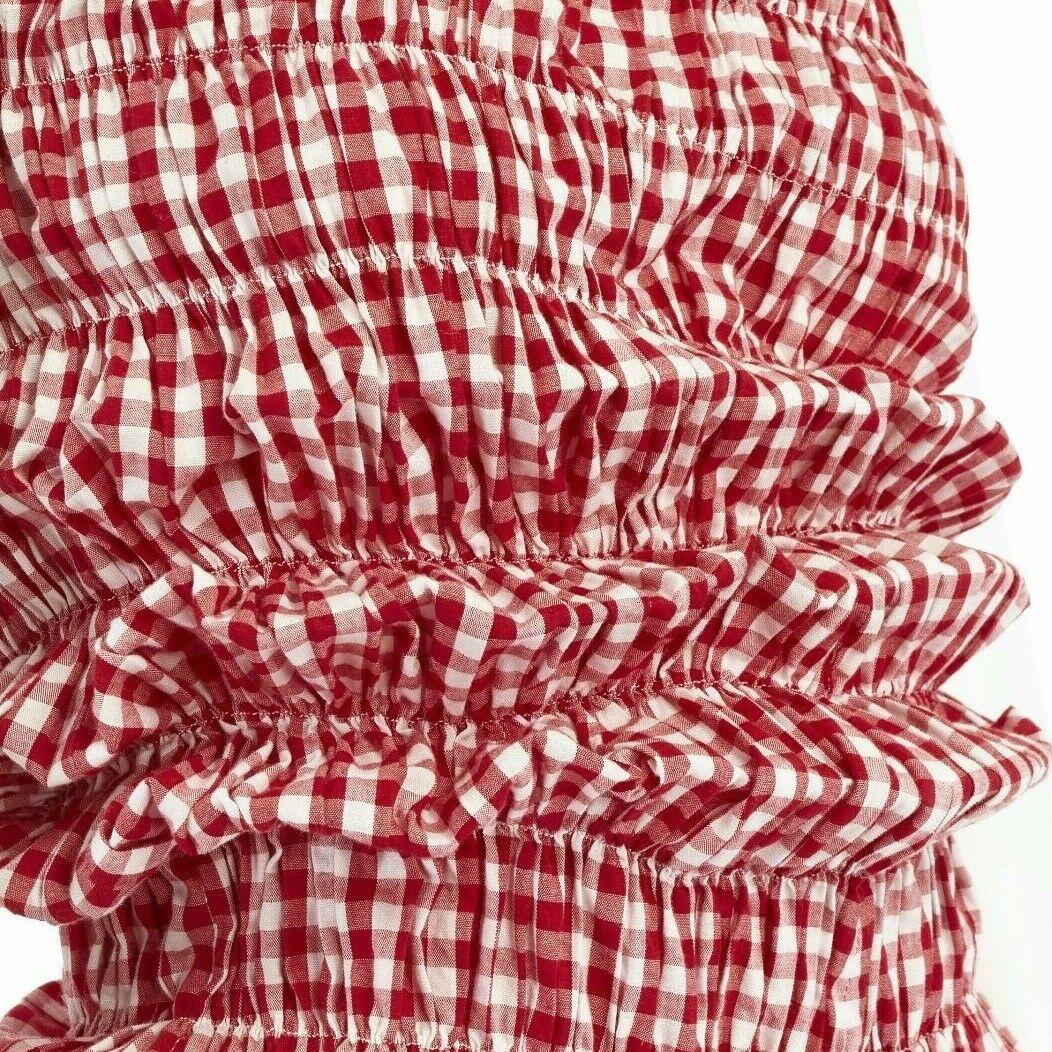 COMME DES GARCONS Vintage SS97 Lumps Bumps red white gingham irregular cut dress
COMME DES GARCONS
Red and white white checked cotton. Lumps and bumps irregular cut body. 
Ruched at body to create irregular volume . Asymmetric neckline and sleeves.