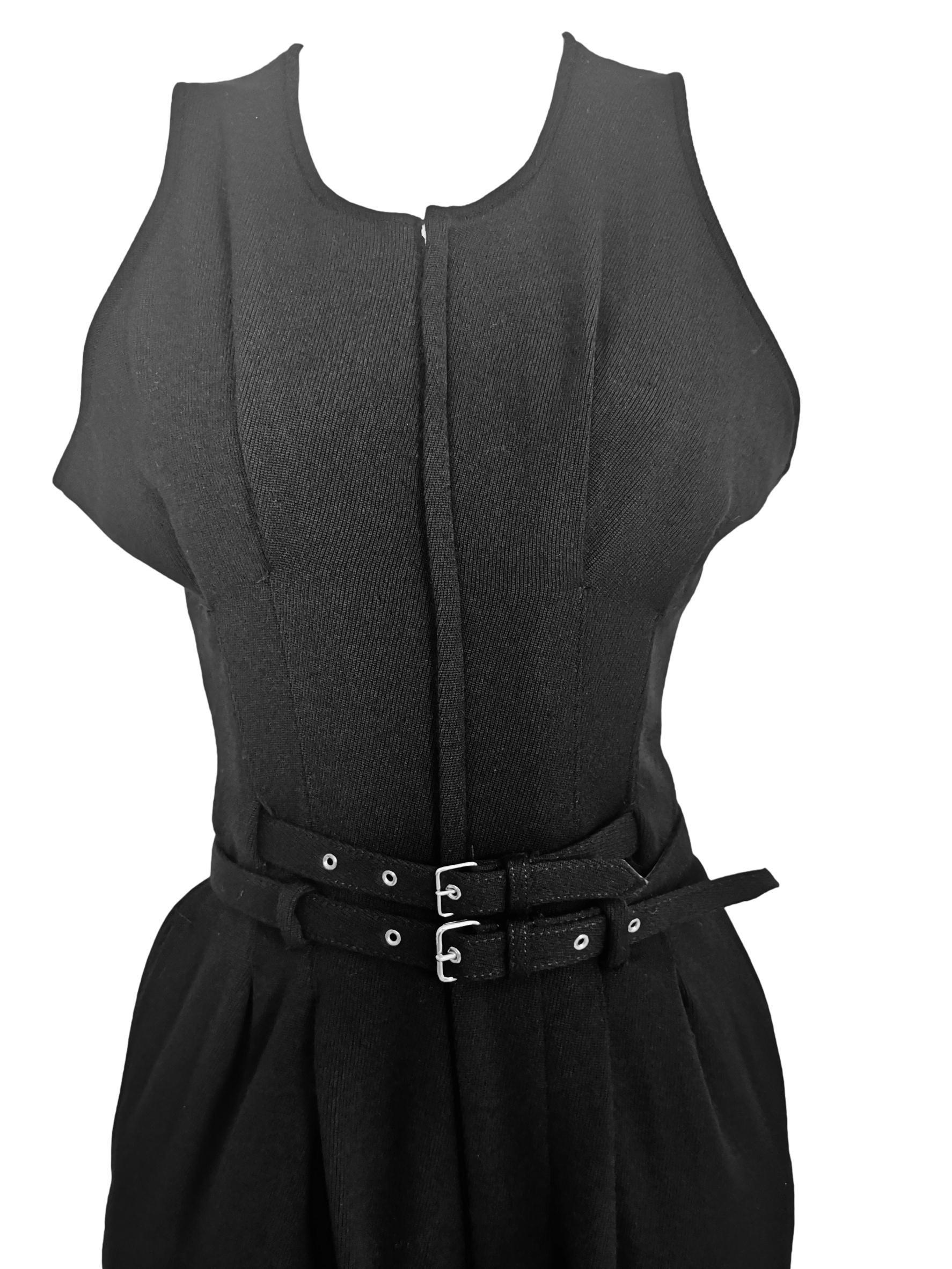 Comme des Garcons AD 1989
Black Wool Jumpsuit
Double Belted
Button Cuff Hem
Size S
26 Inch Waist

