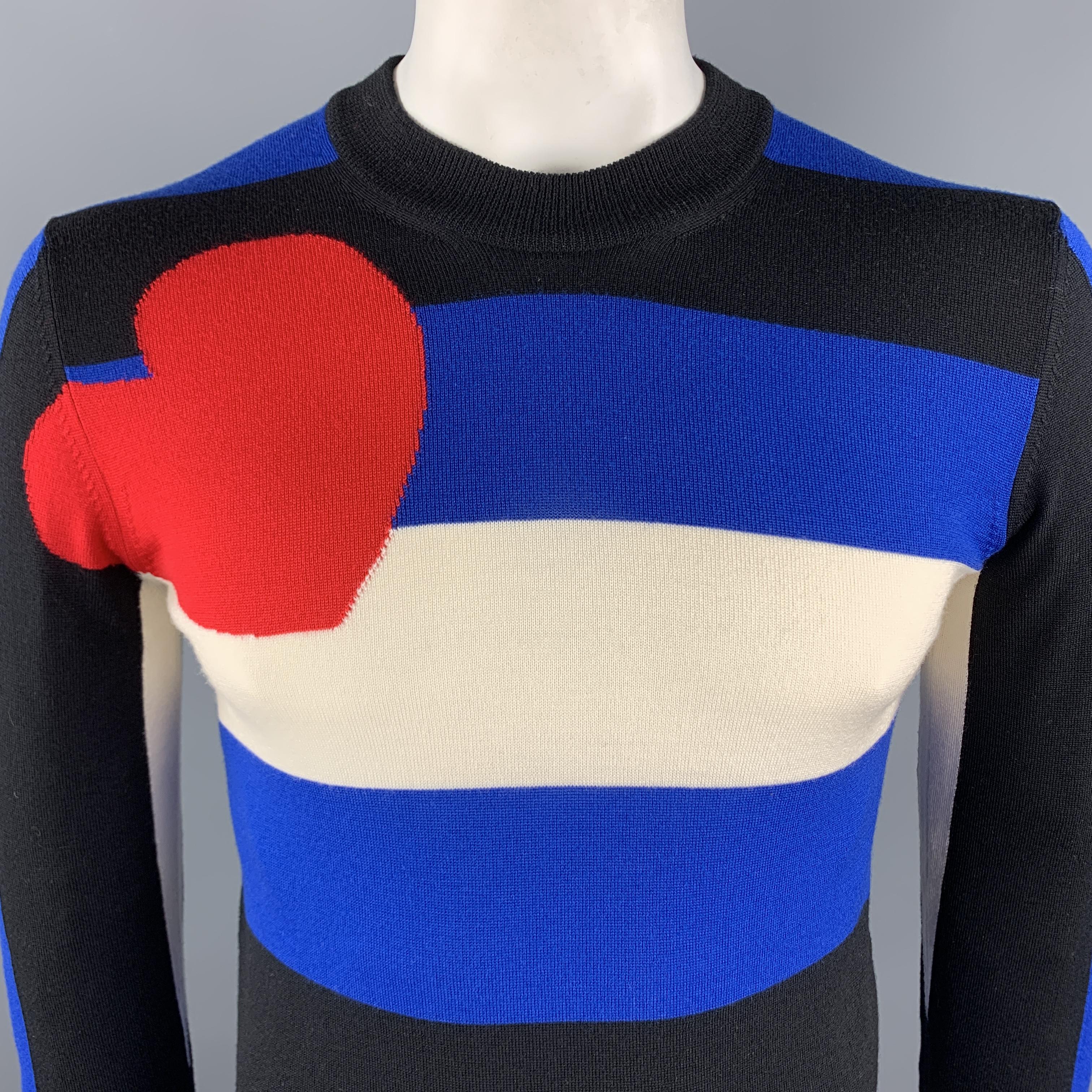 COMME des GARCONS x VETEMENTS Spring 17 Leather Pride Flag Pullover Sweater comes in blue and black wool striped material, with a crewneck, a woven red heart, and ribbed cuffs and hem. Made in Japan. 

Excelent Pre-Owned Condition.
Marked: