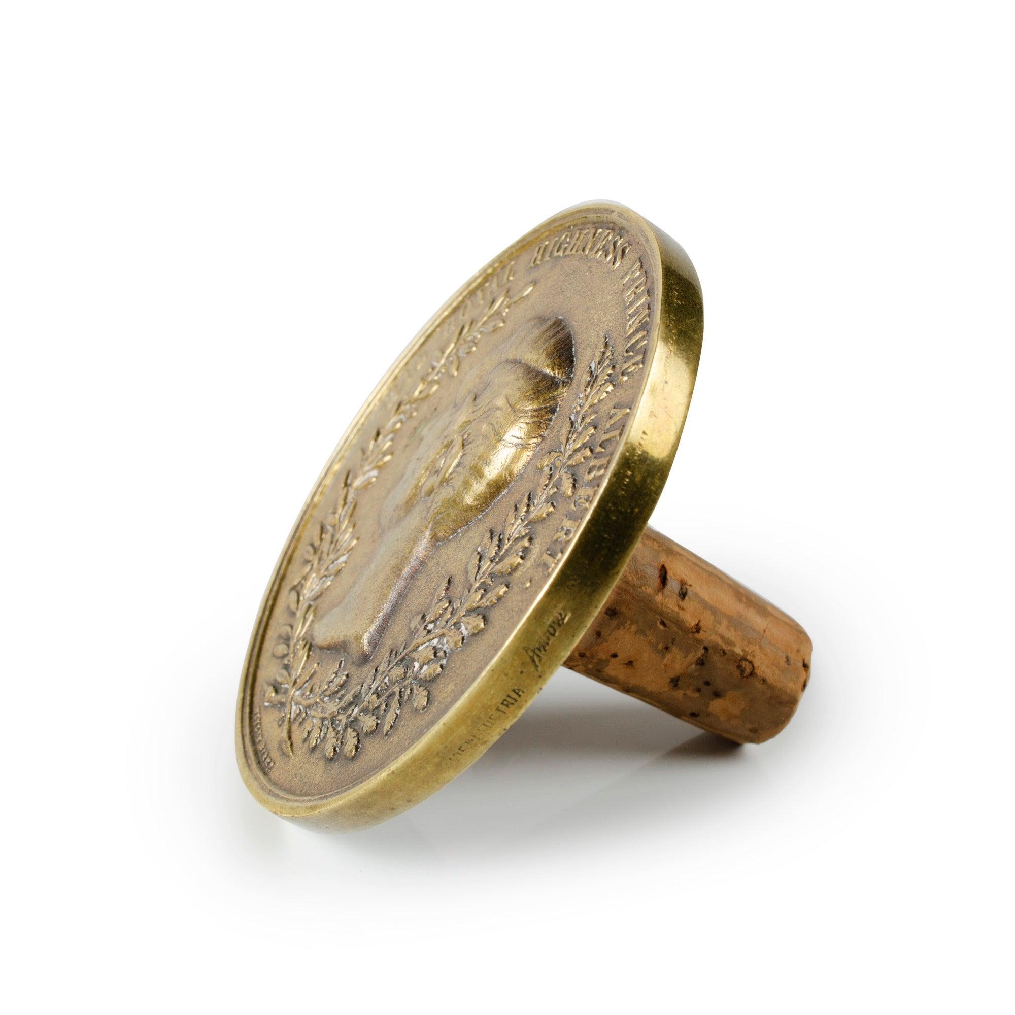 A commemorative coin bottle stopper, celebrating the great exhibit of 1851, with the likeness of young Prince Albert. Wip