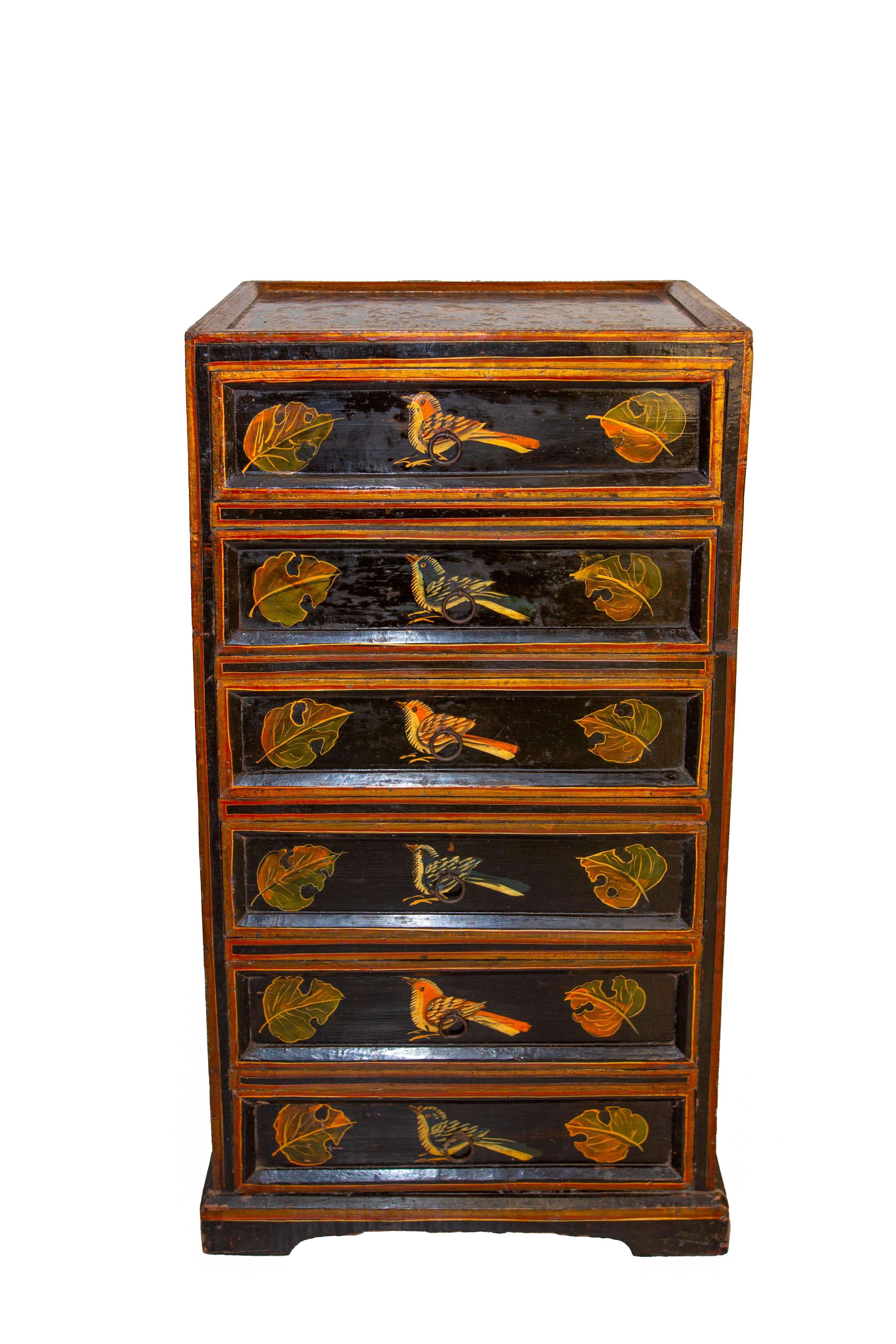 Commode chest of drawers chiffonnier veenered Iroko.
Decorated with exotic birds and leaves
Hand painted with a nice patina due to the years.
Lacquered.
Please see photo not disturbing. 
Good vintage condition

Shipping:
41 / 28  H 78 16Kg