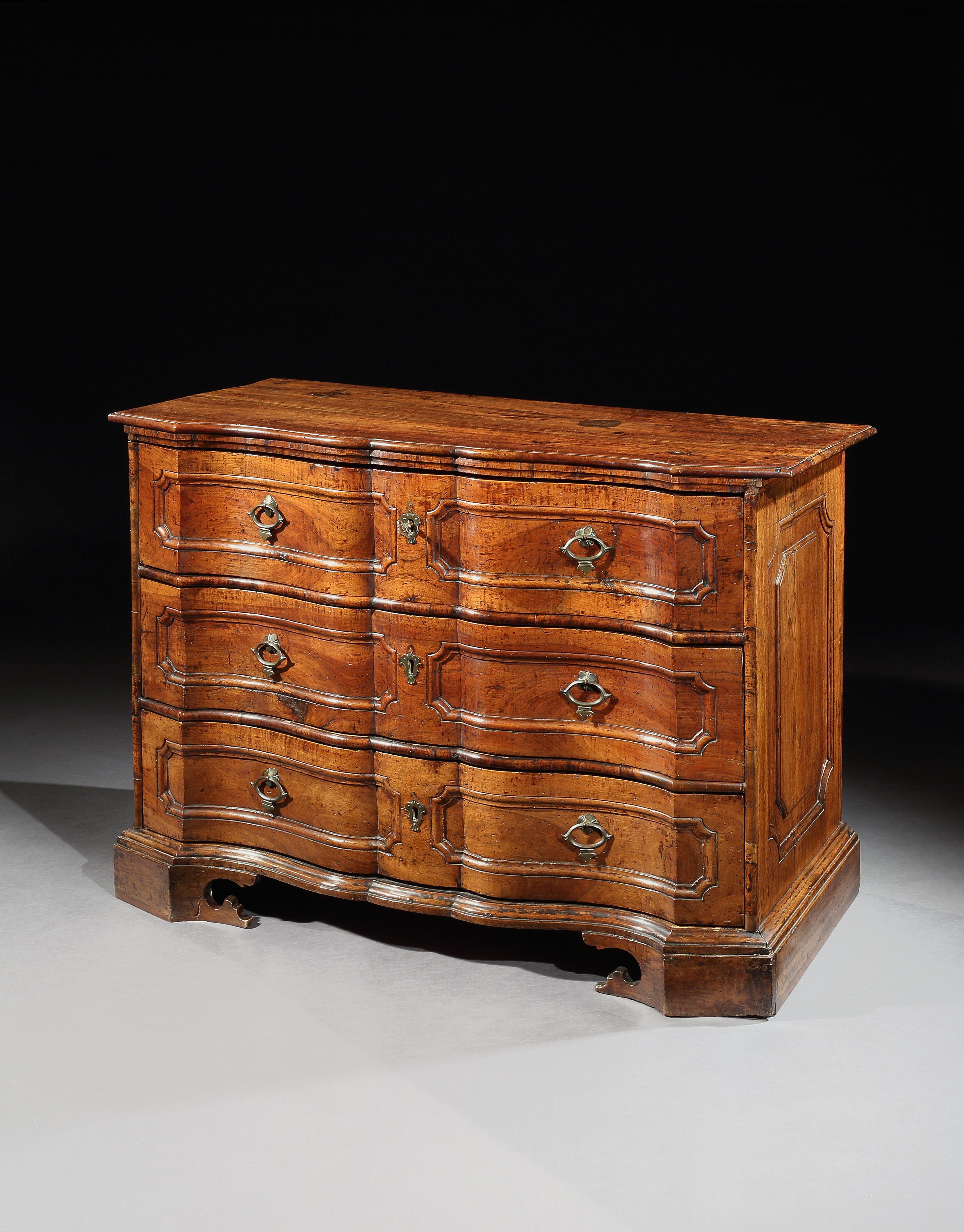 The serpentine front on this magnificent commode is sophisticated and gives it gravitas. It has a rich colour and lustrous patina and has come from a private collection, Semenzato Venezia, 

The rectangular serpentine top in two sections. The