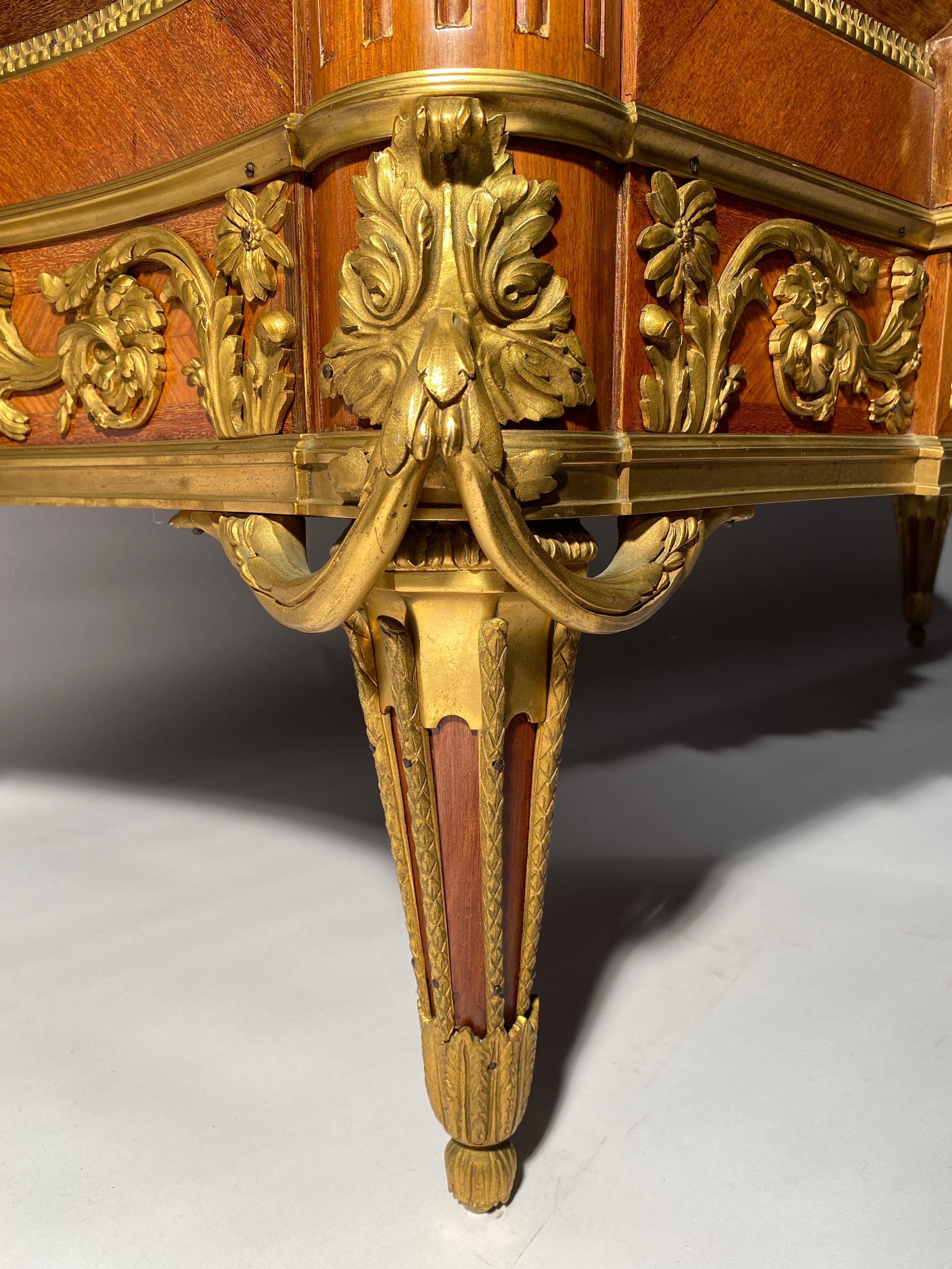 French Marquetry Commode In The Style Of Jean Henri Riesener For Sale