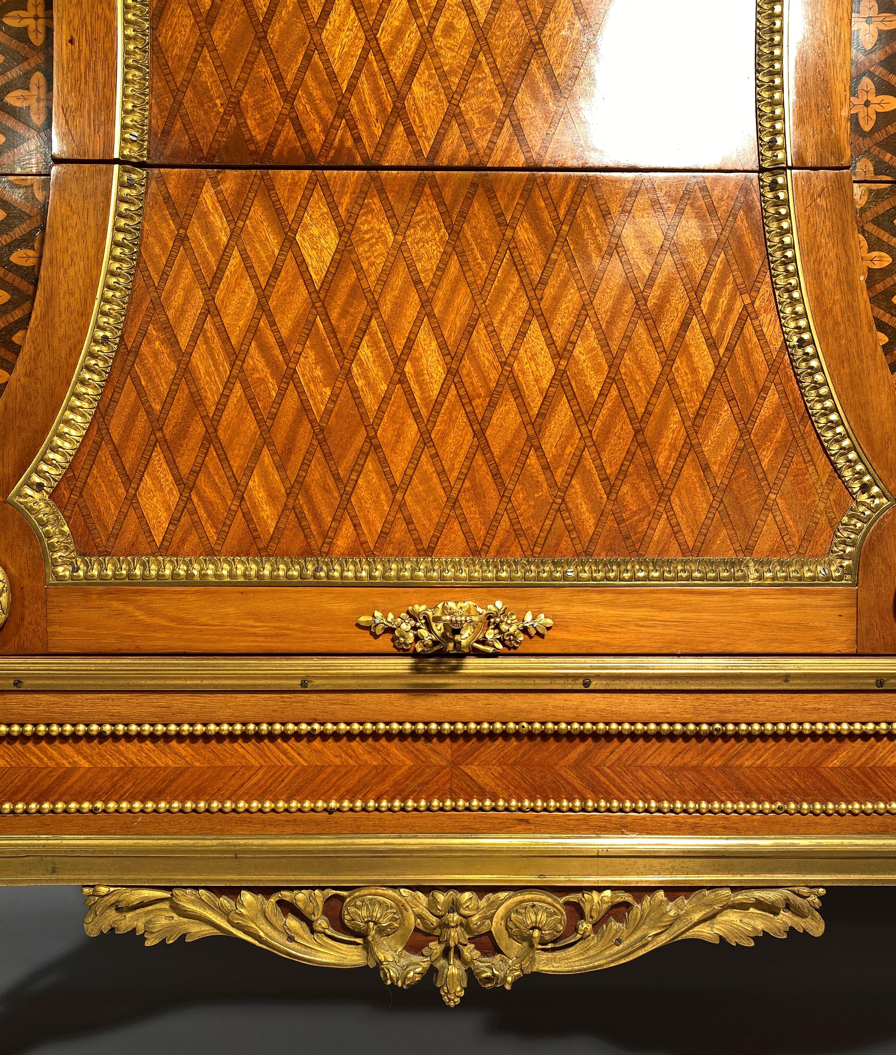 Bronze Marquetry Commode In The Style Of Jean Henri Riesener For Sale