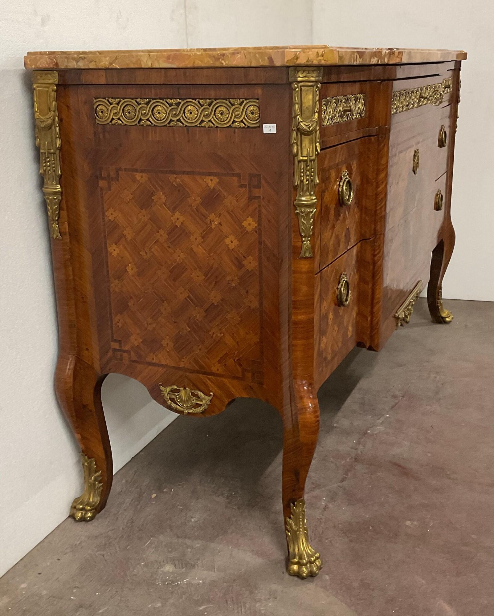Very nice chest of drawers with 6 drawers and a door on the front, inlaid with flowers and geometric patterns, and rich bronze ornamentation: quiver, lion's paws

Good general condition, slight wear from time
Veined marble with a small lack

Early