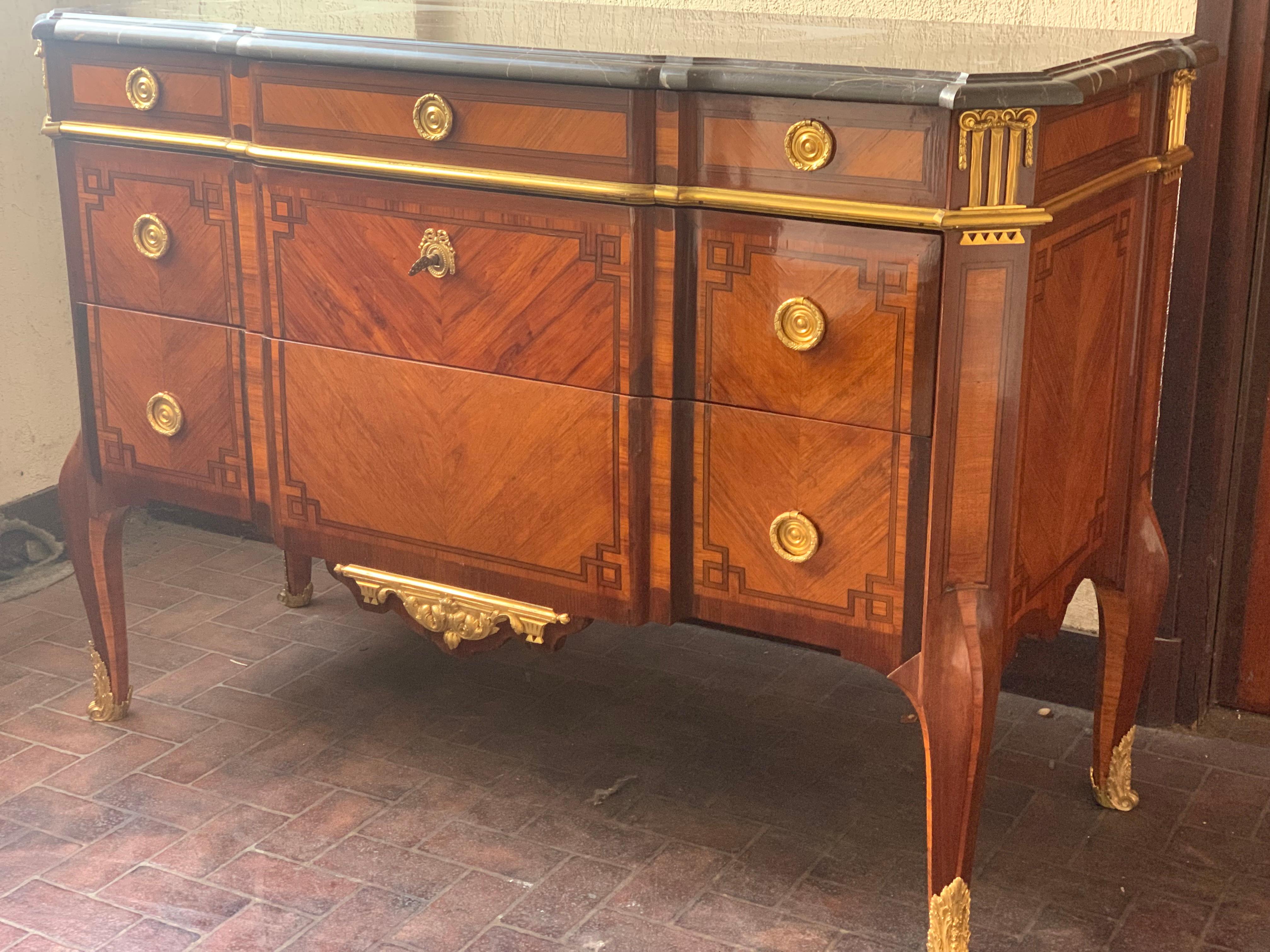 Louis XV, louis XVI transition style chest of drawers, marble top marquetry and bronze
stamped twice by the cabinetmaker P.Chorier and also by maison Soubrier one of the famous retailer of this time establish at the Faubourg st Antoine where all the