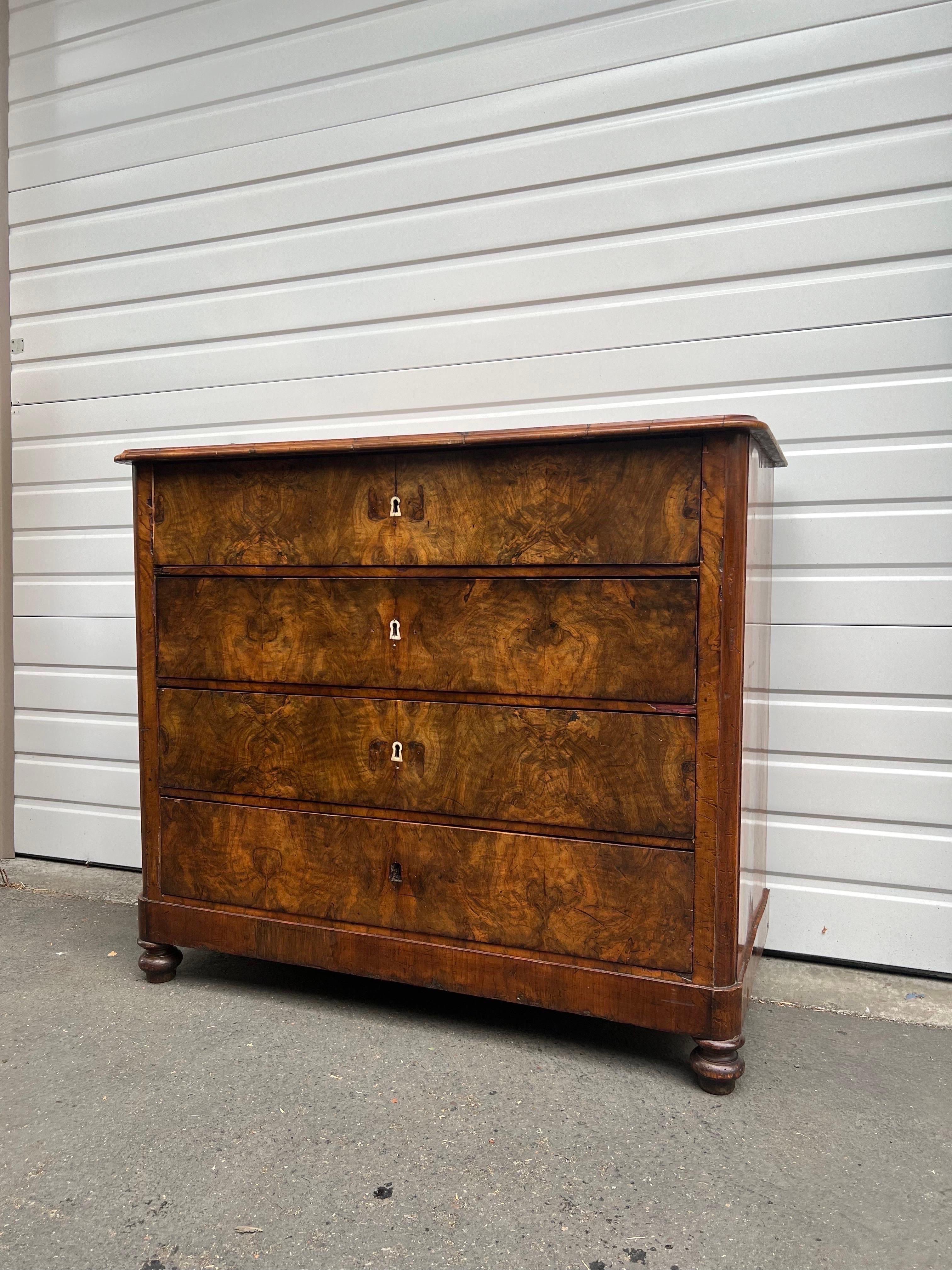 Commode Or Dresser with 4 Large Drawers In Style Of Noble Biedermeier Furniture With Hand Cut Dovetail Drawers Details. Features an iPhone and Elegantly made And Carefully Selected Walnut Grain/Burl Veneer Which Extends overall all Four Drawers.