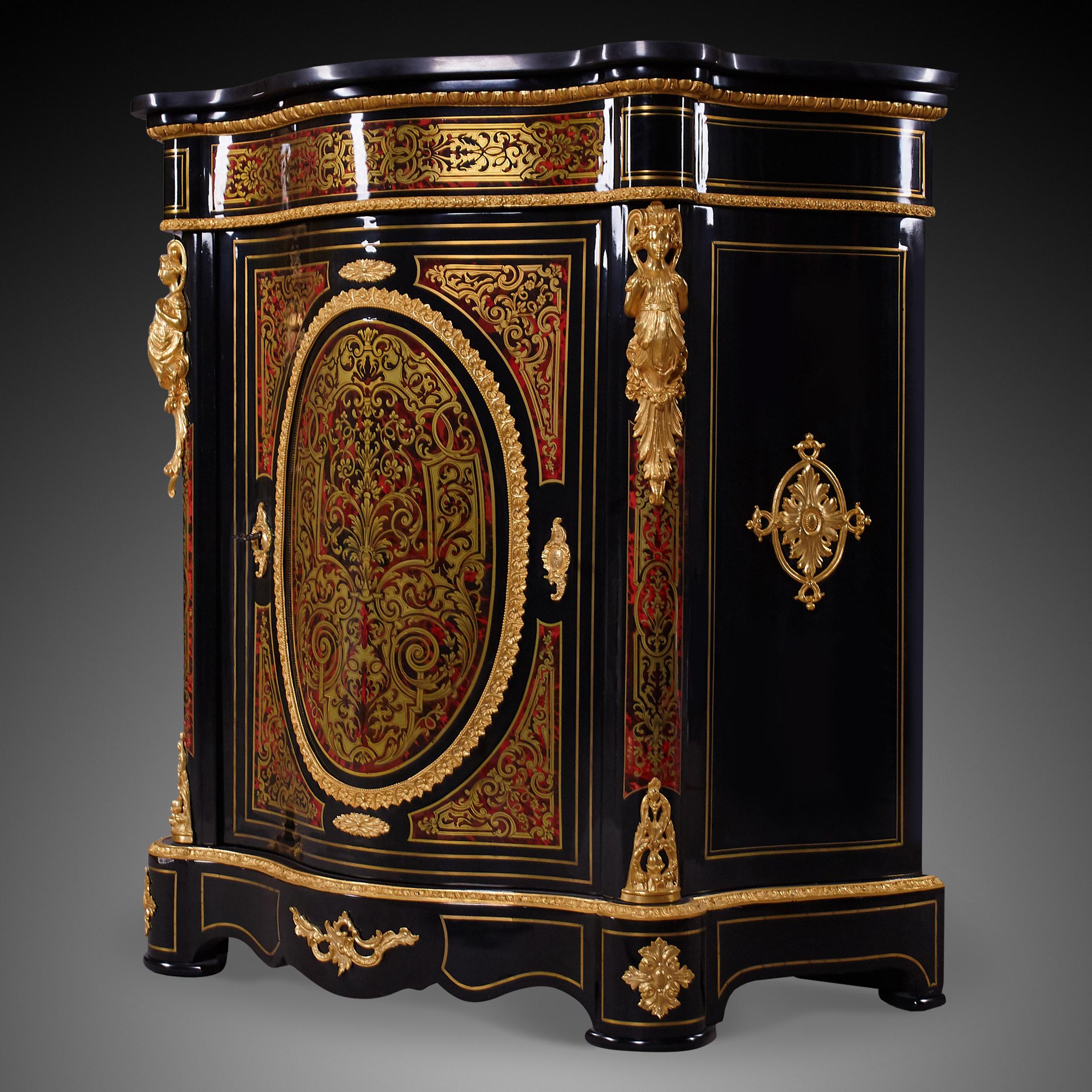 French antique Boulle cabinet.
Boulle one of France’s leading cabinetmakers, whose fashion of inlaying, called boulle, or buhl, work, swept Europe and was heavily imitated during the 18th and 19th centuries. Multitalented, Boulle practiced as an