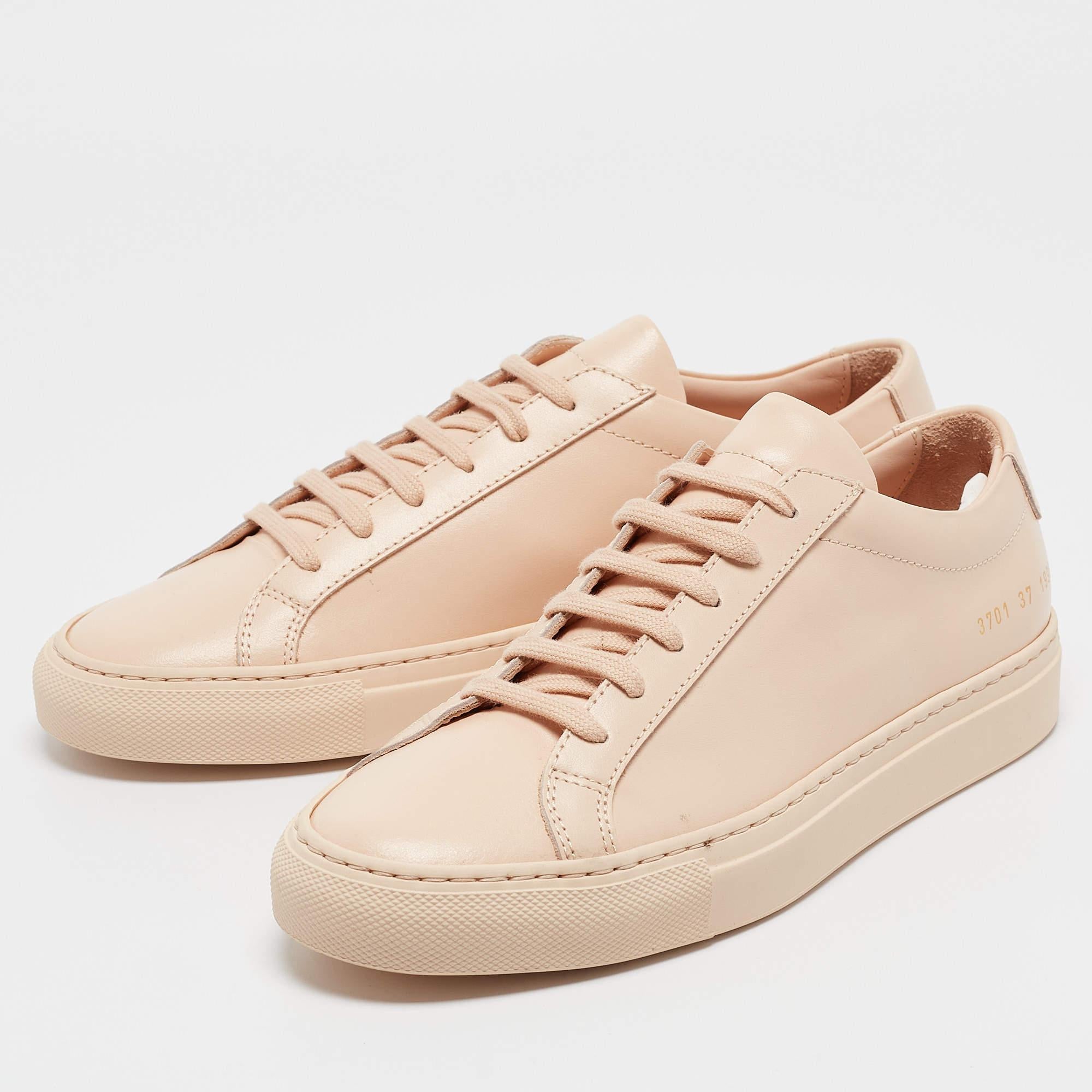 Coming in a classic silhouette  these designer sneakers are a seamless combination of luxury  comfort  and style. These sneakers are finished with signature details and comfortable insoles.