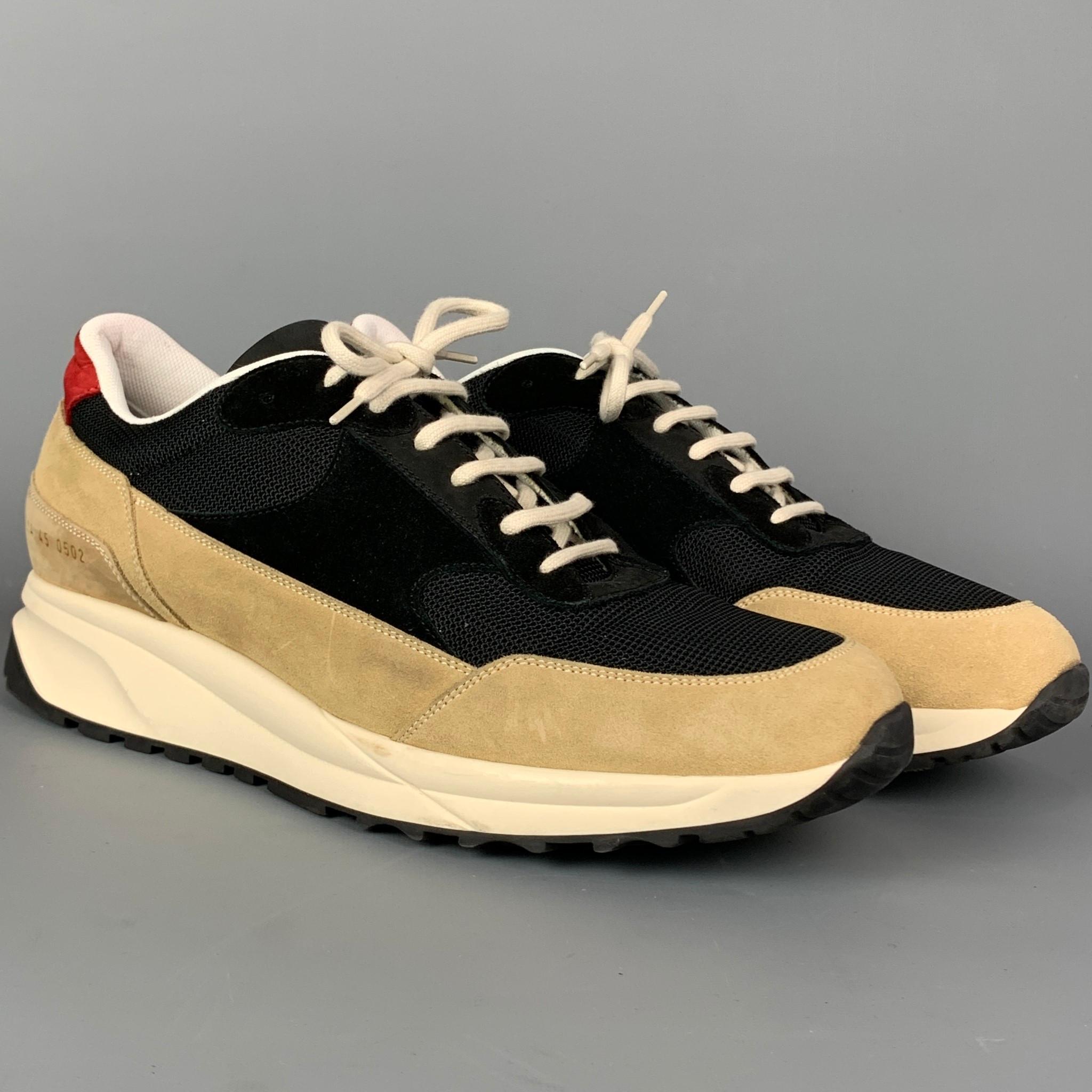 COMMON PROJECTS sneakers comes in a tan suede with a color block navy nylon featuring a rubber sole and a lace up closure. Made in Italy.

Very Good Pre-Owned Condition.
Marked: 2214 45 0502

Outsole:

12 in. x 4.5 in. 

SKU: 109952
Category: