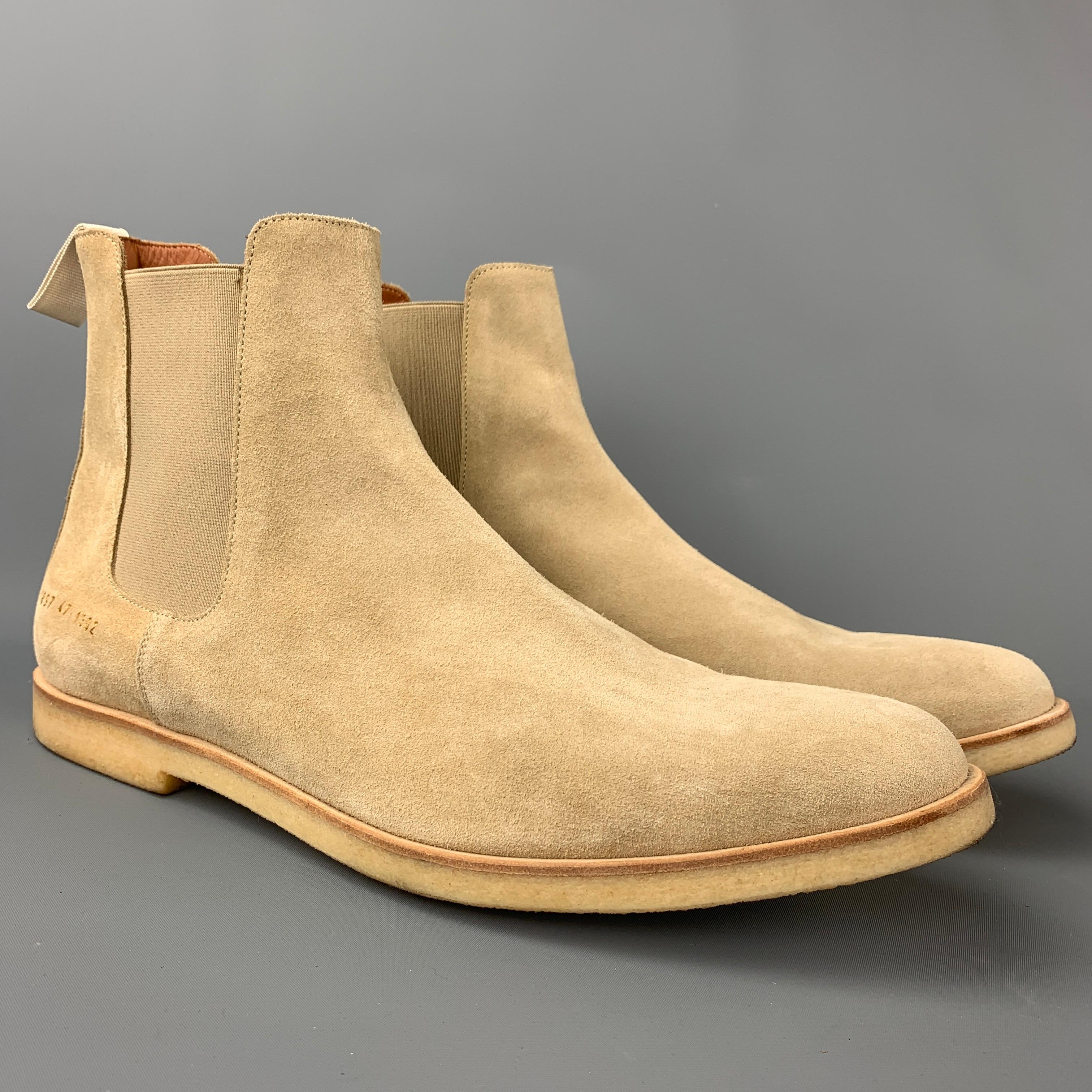 COMMON PROJECTS boots comes in a beige suede featuring a chelsea style, slip on, and a creep sole. Made in Italy.

Very Good Pre-Owned Condition.
Marked: 1897 47 1302
Original Retail Price: $530.00

Measurements:

Length: 13 in.
Width: 4.5