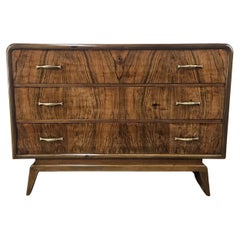 Art Deco walnut burl dresser with black glass top and brass handles
