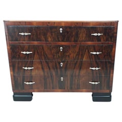 Ebony Commodes and Chests of Drawers