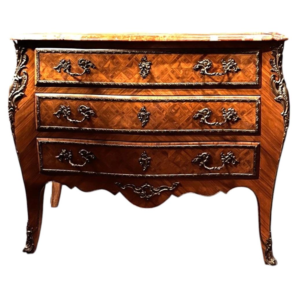 Chest of drawers with bronze inlays, circa 1920. For Sale