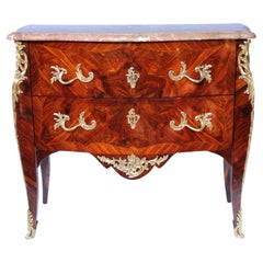 Bois de rose panelled dresser, Christophe Wolff, Paris, mid-18th century