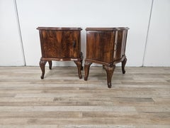Chippendale nightstands with curved doors and carved legs