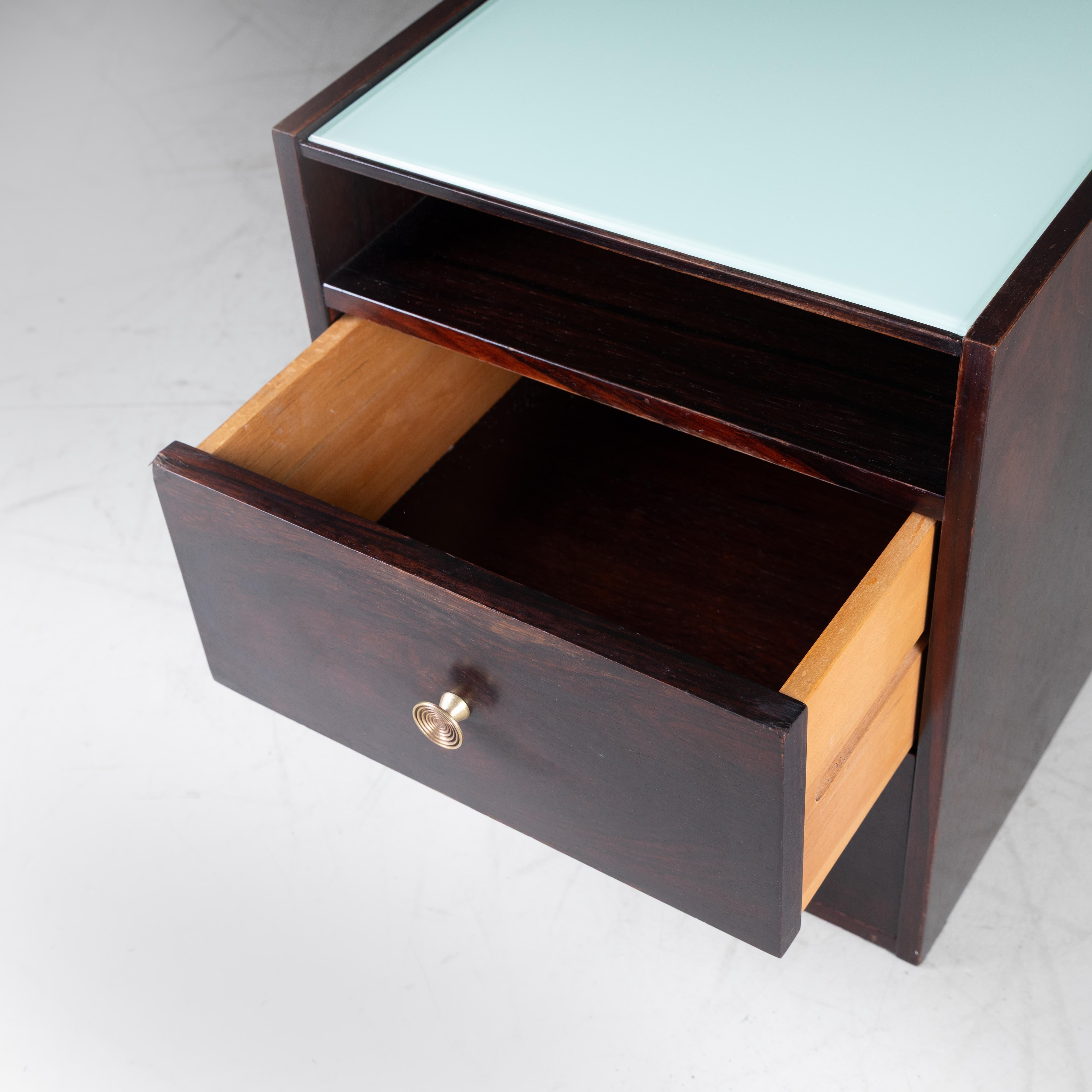 Pair of bedside tables mod. D154, Carlo De Carli, Sormani, Italy, 1963. Lacquered wood frame with brass details and green glass top. In good overall condition, restored wood and new glass. Provenance: private home.