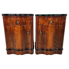 Mahogany and ebony bedside tables with black glass top, Art Deco 20th century