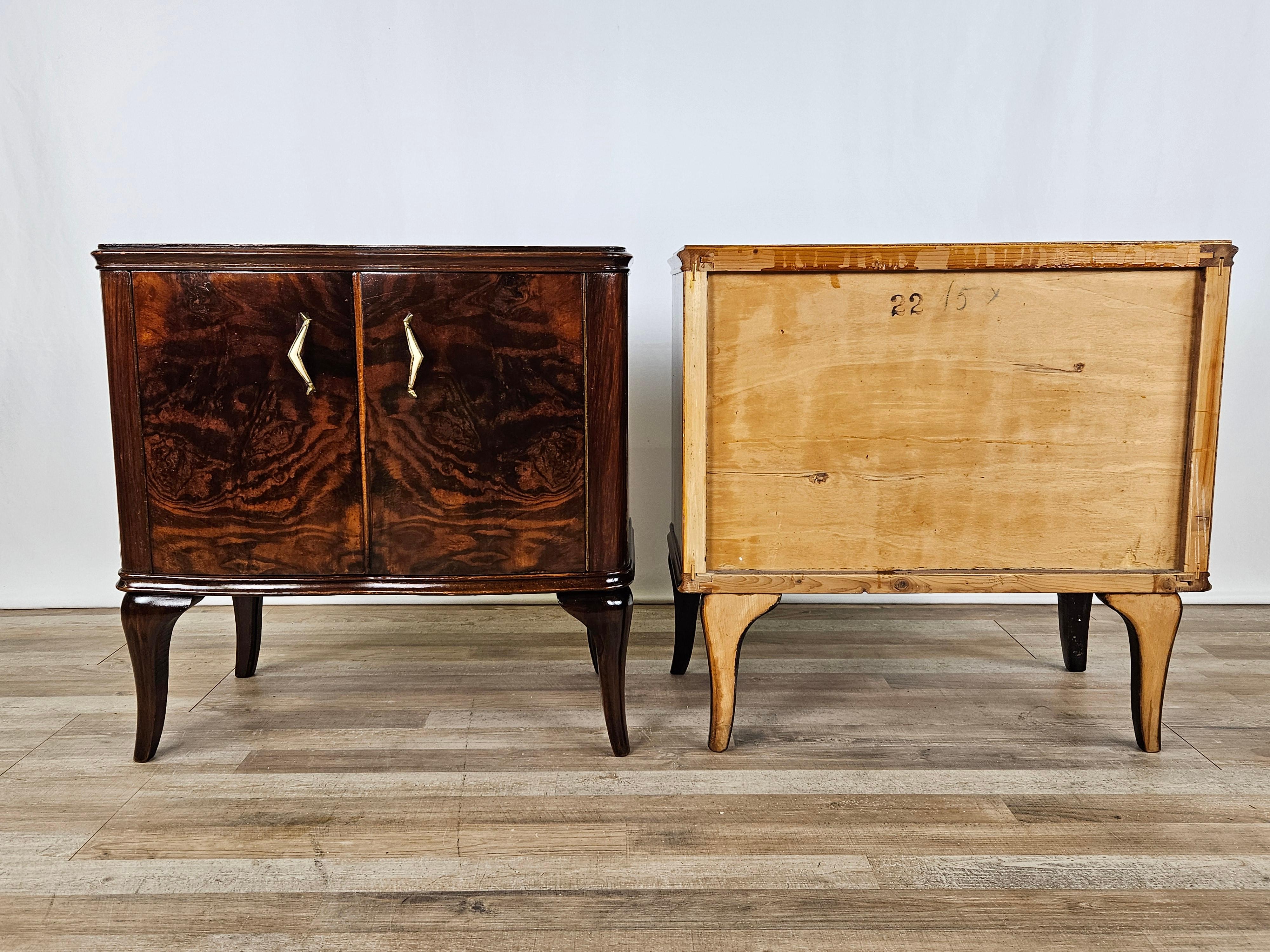 Italian Walnut bedside tables 1950s with brass handles and moved legs 20th century For Sale