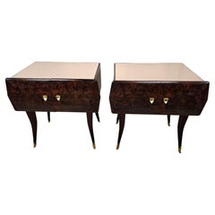 Mid Century bedside tables in rosewood and maple with pink glass