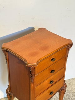 Refined wooden bedside table with decorative carvings "Charme Royale," 1970s