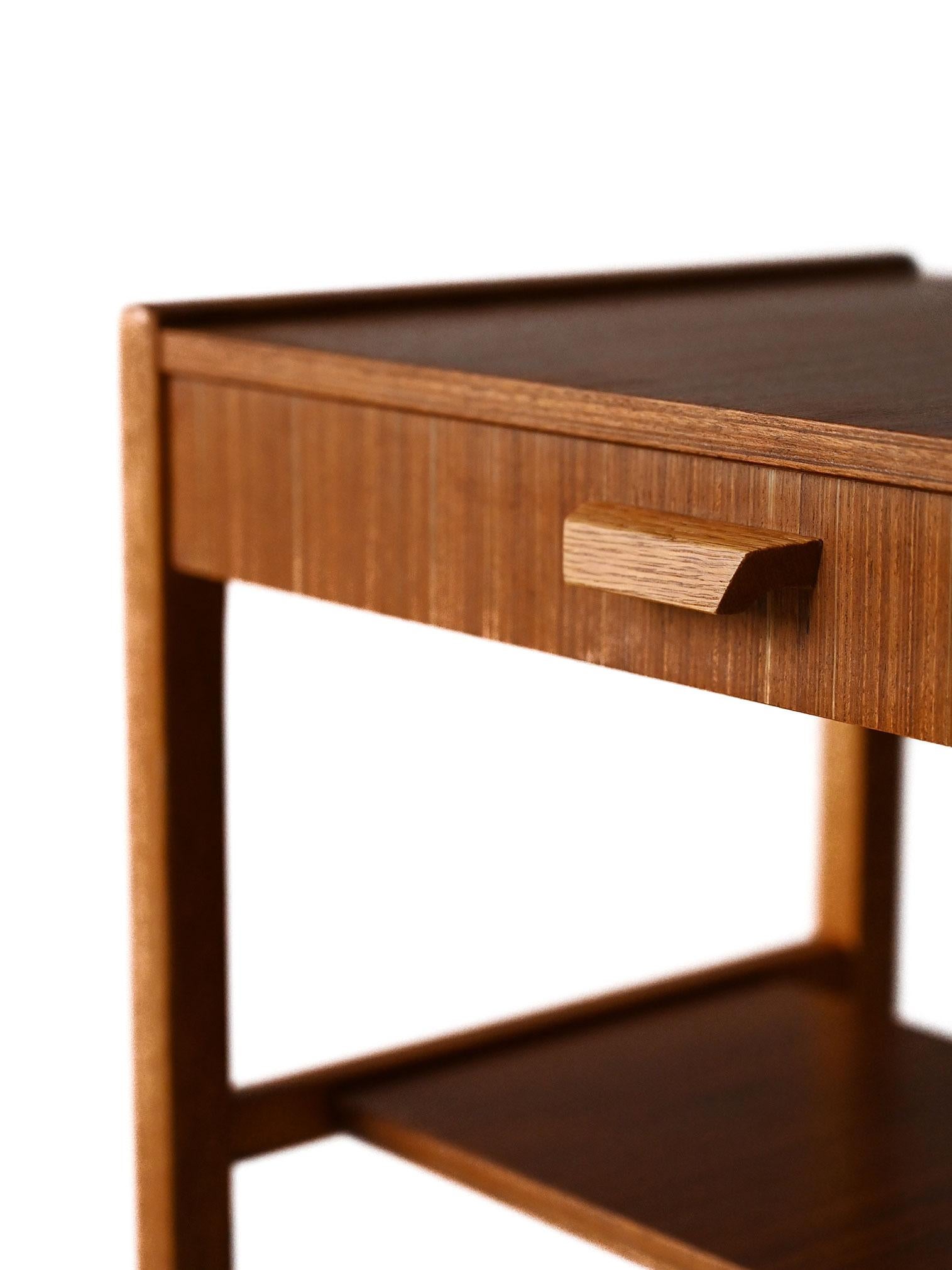 Teak Scandinavian nightstand with carved handle For Sale