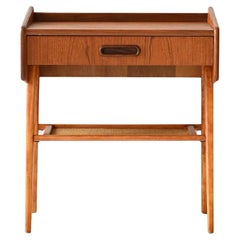 Scandinavian teak and rattan bedside table