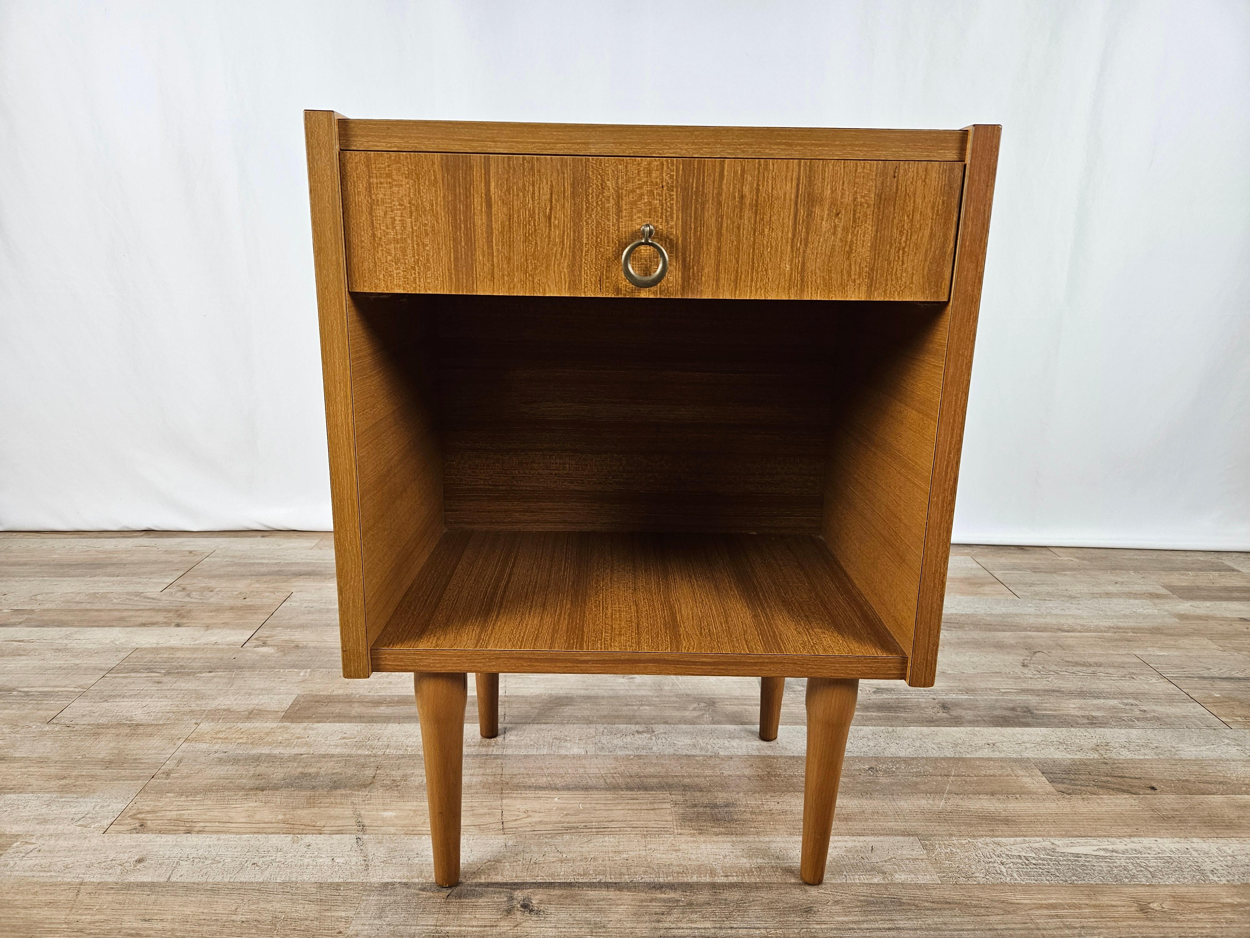 Italian-made 1980s single room nightstand with drawer and central open compartment.