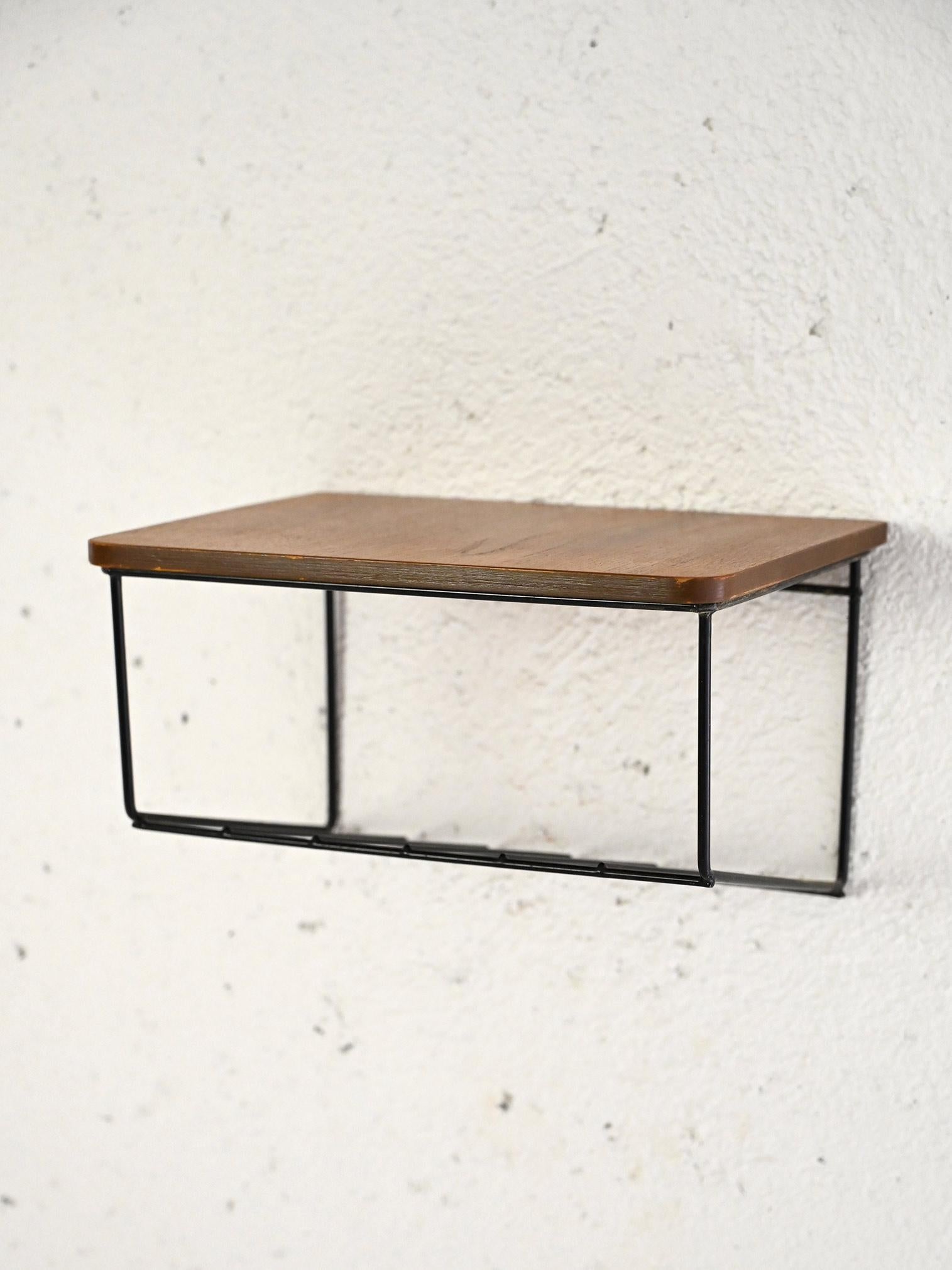 Original Scandinavian-made shelf from the 1960s.

A simple and functional industrial-style furniture piece consisting of a metal shelf frame and a rectangular teak countertop. 
Ideal as a bedside table but also as a shelf for the entryway or