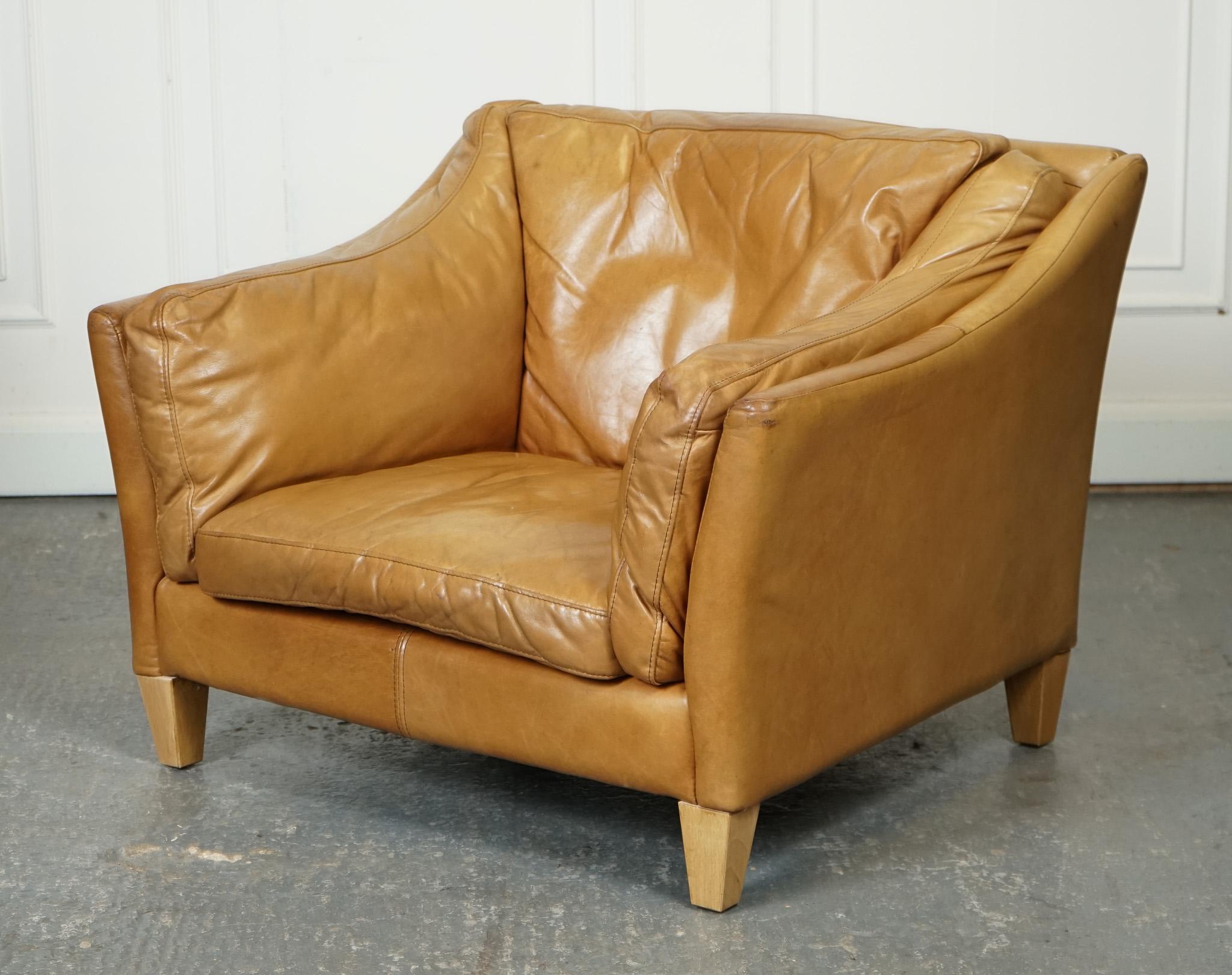 
We are delighted to offer for sale this Lovely Halo Reggio Tan Leather Armchair.

A compact and comfortable piece of furniture. Made with high-quality tan leather upholstery, this chair exudes a timeless and elegant look.

Despite its smaller size,