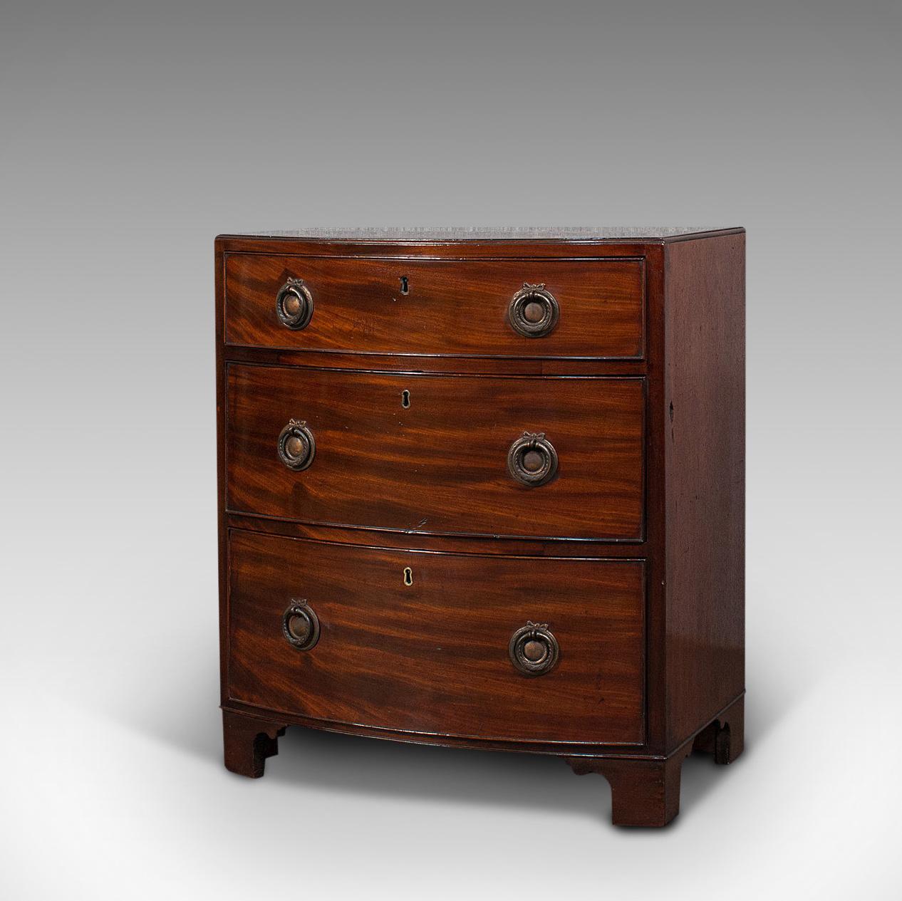 This is a superb, compact antique chest of drawers. An English, mahogany bedside stand, dating to the Georgian period, circa 1780.

An abundance of Georgian appeal with striking mahogany stocks
Displaying a desirable aged patina
Select mahogany