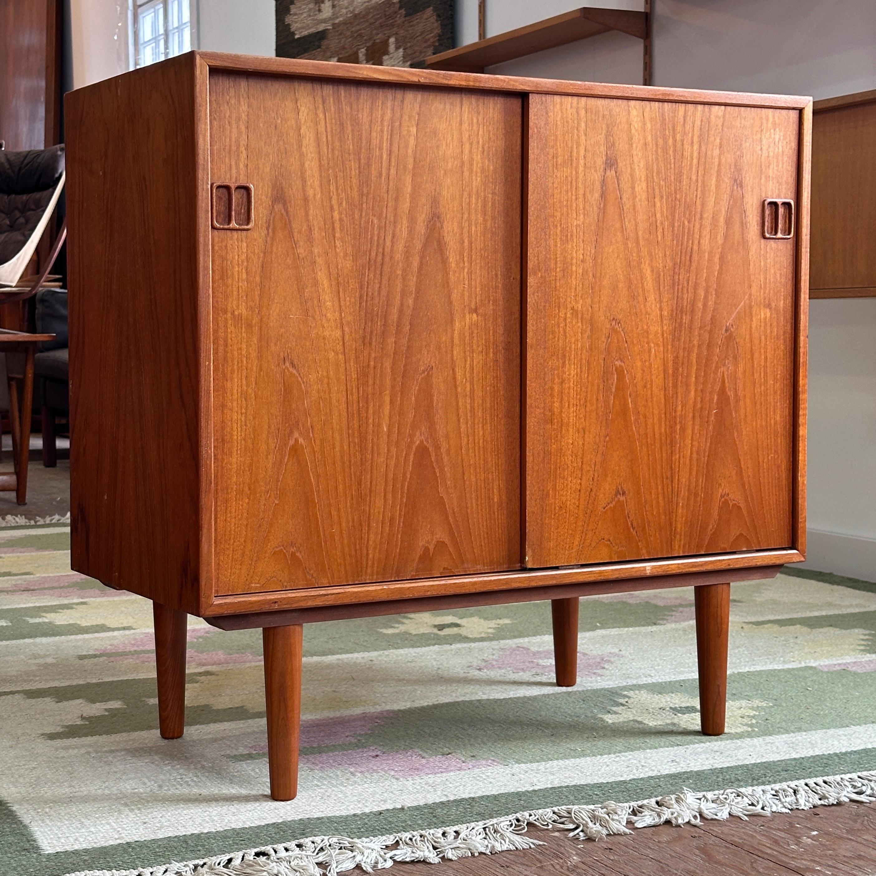 Condition: Pre-Restored

Dimensions: 33.75” L x 16.5” D x 32.25” H

Description: A vintage teak compact sideboard. Freshly imported from Denmark.

Price includes refinish, Turn-around time 3-4 weeks after purchase. Also available as-is for a lower