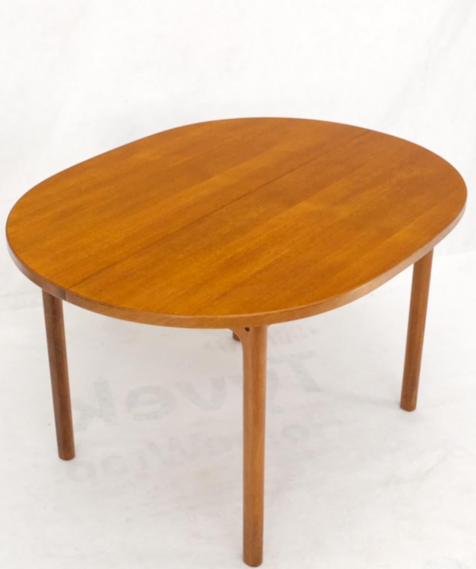 Compact teak Danish Mid-Century Modern dining table w/ large 20