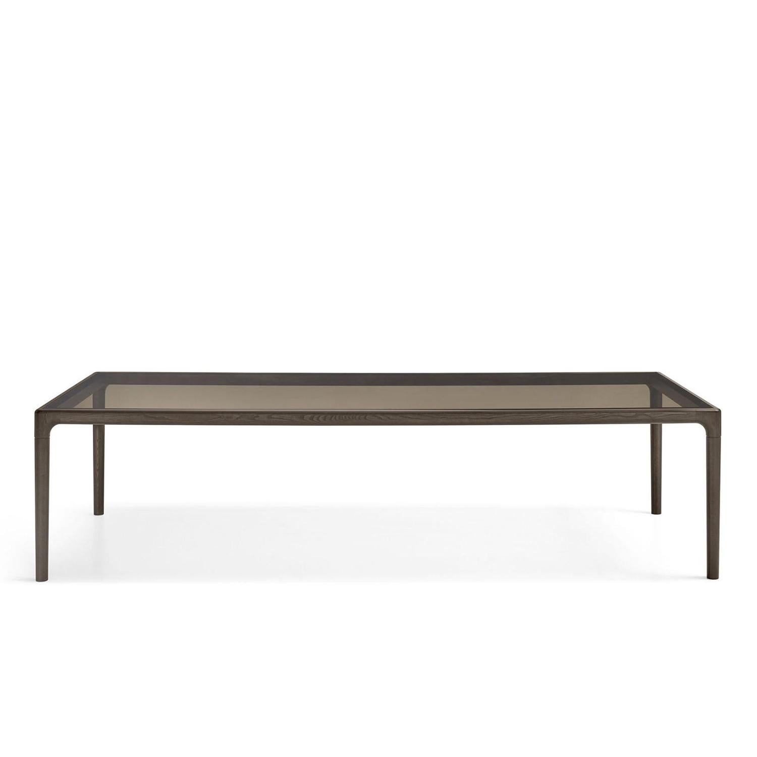 Table à manger Tabac compact avec structure en 
bois massif teinté tabac, avec 8 mm d'épaisseur. 
plateau de table en verre épais, finition bronze. Verre 
Capacité maximale : 100 kilos.
Également disponible sur demande avec une structure solide