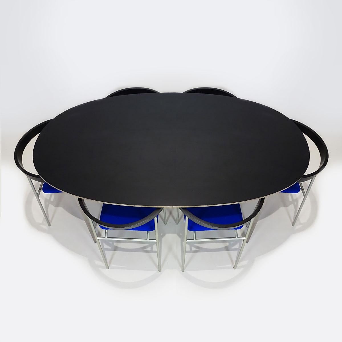 Space saving vintage Danish dining set featuring a black topped oval dining table and 6 stackable Jørgen Gammelgaard bentwood and steel dining chairs.

Designed by Jørgen Gammelgaard in the 1980s the Skagen chair (produced by Schiang) was lauded